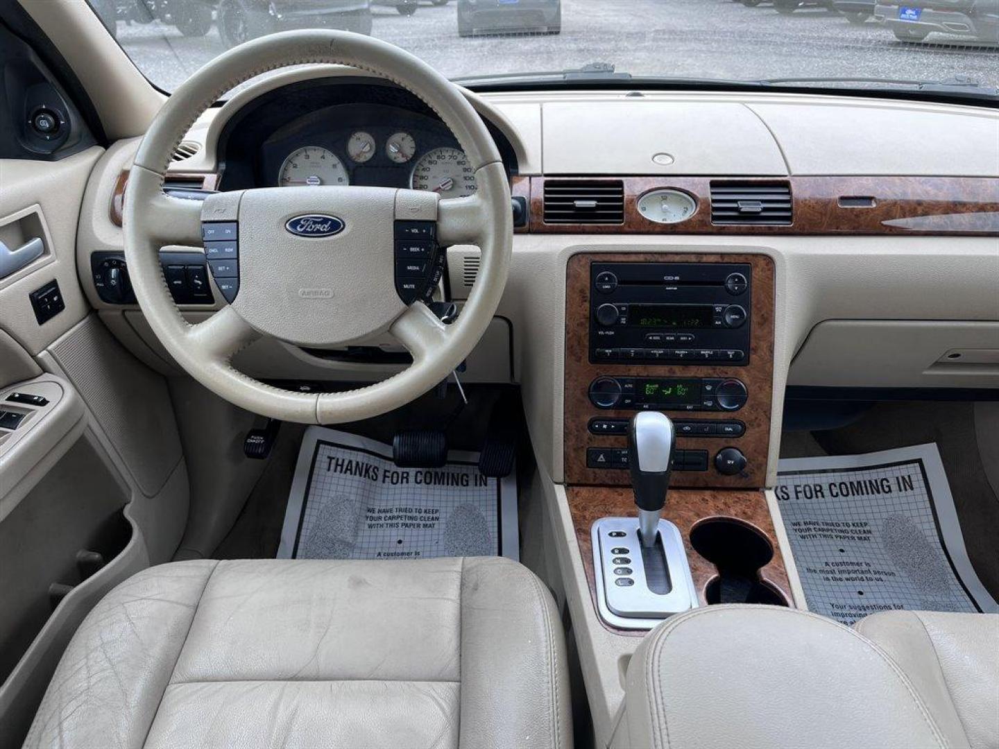 2005 Green /Tan Ford Five Hundred (1FAHP25175G) with an 3.0l V6 EFI 3.0l engine, Automatic transmission, located at 745 East Steele Rd., West Columbia, SC, 29170, (803) 755-9148, 33.927212, -81.148483 - Special Internet Price! 2005 Ford Five Hundred Limited with AM/FM stereo, Sunroof, Cruise control, Leather interior, Powered driver seat, Keyless entry keypad, Powered windows, Powered door locks, Plus more! - Photo#4