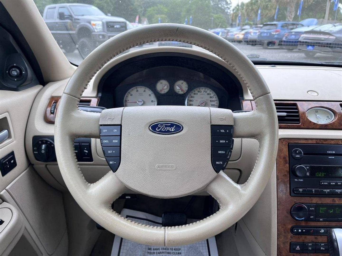 2005 Green /Tan Ford Five Hundred (1FAHP25175G) with an 3.0l V6 EFI 3.0l engine, Automatic transmission, located at 745 East Steele Rd., West Columbia, SC, 29170, (803) 755-9148, 33.927212, -81.148483 - Special Internet Price! 2005 Ford Five Hundred Limited with AM/FM stereo, Sunroof, Cruise control, Leather interior, Powered driver seat, Keyless entry keypad, Powered windows, Powered door locks, Plus more! - Photo#5