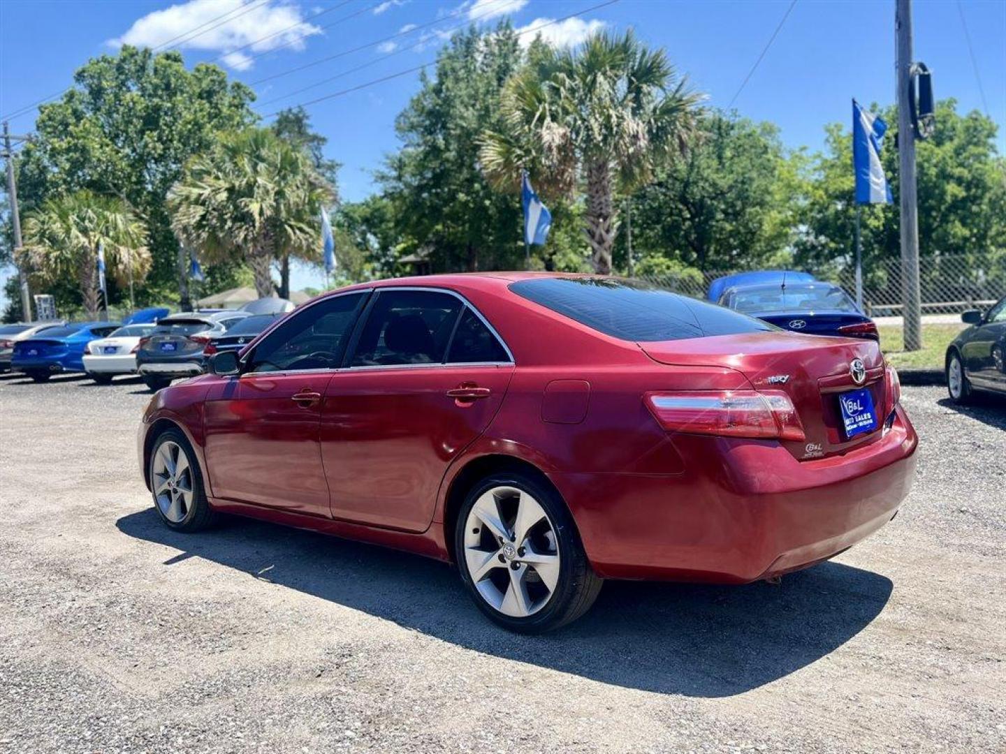 2007 Red /Tan Toyota Camry (JTNBE46K273) with an 2.4l I-4 SFI Dohc 2.4l engine, Automatic transmission, located at 745 East Steele Rd., West Columbia, SC, 29170, (803) 755-9148, 33.927212, -81.148483 - Special Internet Price! 2007 Toyota Camry LE with AM/FM stereo, CD player, Cruise control, Remote keyless entry, Front bucket seats, Rear 60/40 split-folding seats, Powered windows, Powered door locks, Plus more! - Photo#1