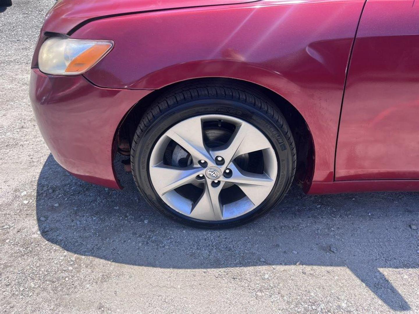 2007 Red /Tan Toyota Camry (JTNBE46K273) with an 2.4l I-4 SFI Dohc 2.4l engine, Automatic transmission, located at 745 East Steele Rd., West Columbia, SC, 29170, (803) 755-9148, 33.927212, -81.148483 - Special Internet Price! 2007 Toyota Camry LE with AM/FM stereo, CD player, Cruise control, Remote keyless entry, Front bucket seats, Rear 60/40 split-folding seats, Powered windows, Powered door locks, Plus more! - Photo#27