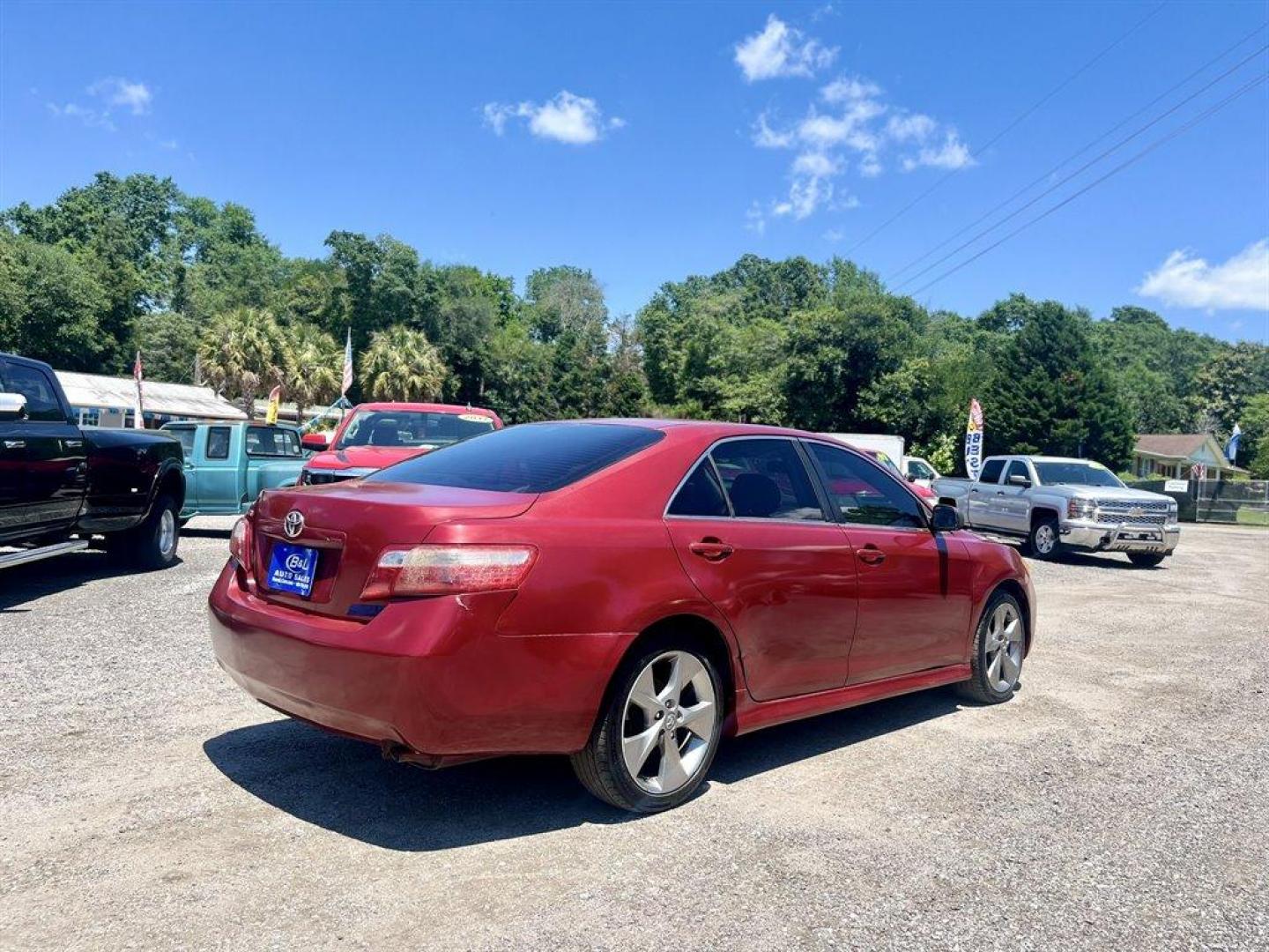 2007 Red /Tan Toyota Camry (JTNBE46K273) with an 2.4l I-4 SFI Dohc 2.4l engine, Automatic transmission, located at 745 East Steele Rd., West Columbia, SC, 29170, (803) 755-9148, 33.927212, -81.148483 - Special Internet Price! 2007 Toyota Camry LE with AM/FM stereo, CD player, Cruise control, Remote keyless entry, Front bucket seats, Rear 60/40 split-folding seats, Powered windows, Powered door locks, Plus more! - Photo#2