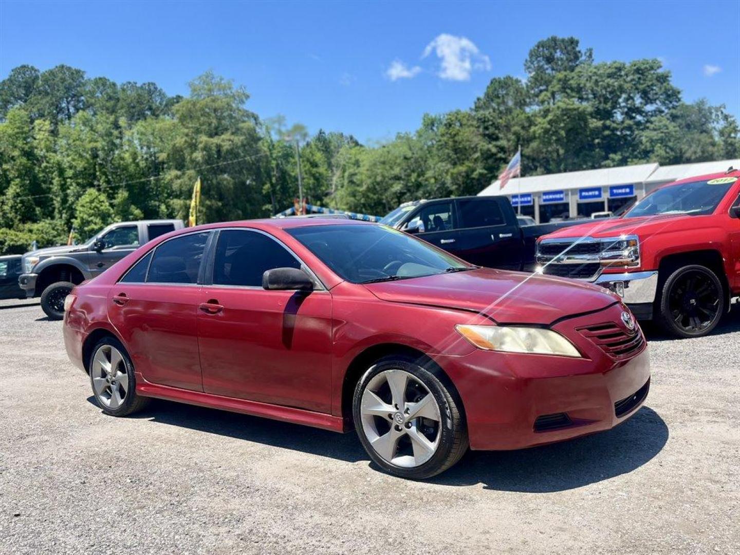 2007 Red /Tan Toyota Camry (JTNBE46K273) with an 2.4l I-4 SFI Dohc 2.4l engine, Automatic transmission, located at 745 East Steele Rd., West Columbia, SC, 29170, (803) 755-9148, 33.927212, -81.148483 - Special Internet Price! 2007 Toyota Camry LE with AM/FM stereo, CD player, Cruise control, Remote keyless entry, Front bucket seats, Rear 60/40 split-folding seats, Powered windows, Powered door locks, Plus more! - Photo#3