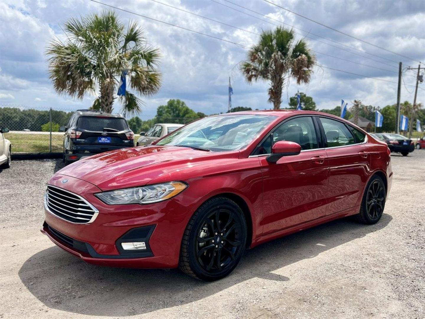 2020 Burgundy /Grey Ford Fusion (3FA6P0HD6LR) with an 1.5l I-4 DI Dohc Ecoboost engine, Automatic transmission, located at 745 East Steele Rd., West Columbia, SC, 29170, (803) 755-9148, 33.927212, -81.148483 - Special Internet Price! 2020 Ford Fusion SE with Bluetooth, Backup camera, Cruise control, Keyless entry, Push to start, Cloth interior, Powered driver seat, Powered windows, Powered door locks, Plus more! - Photo#0