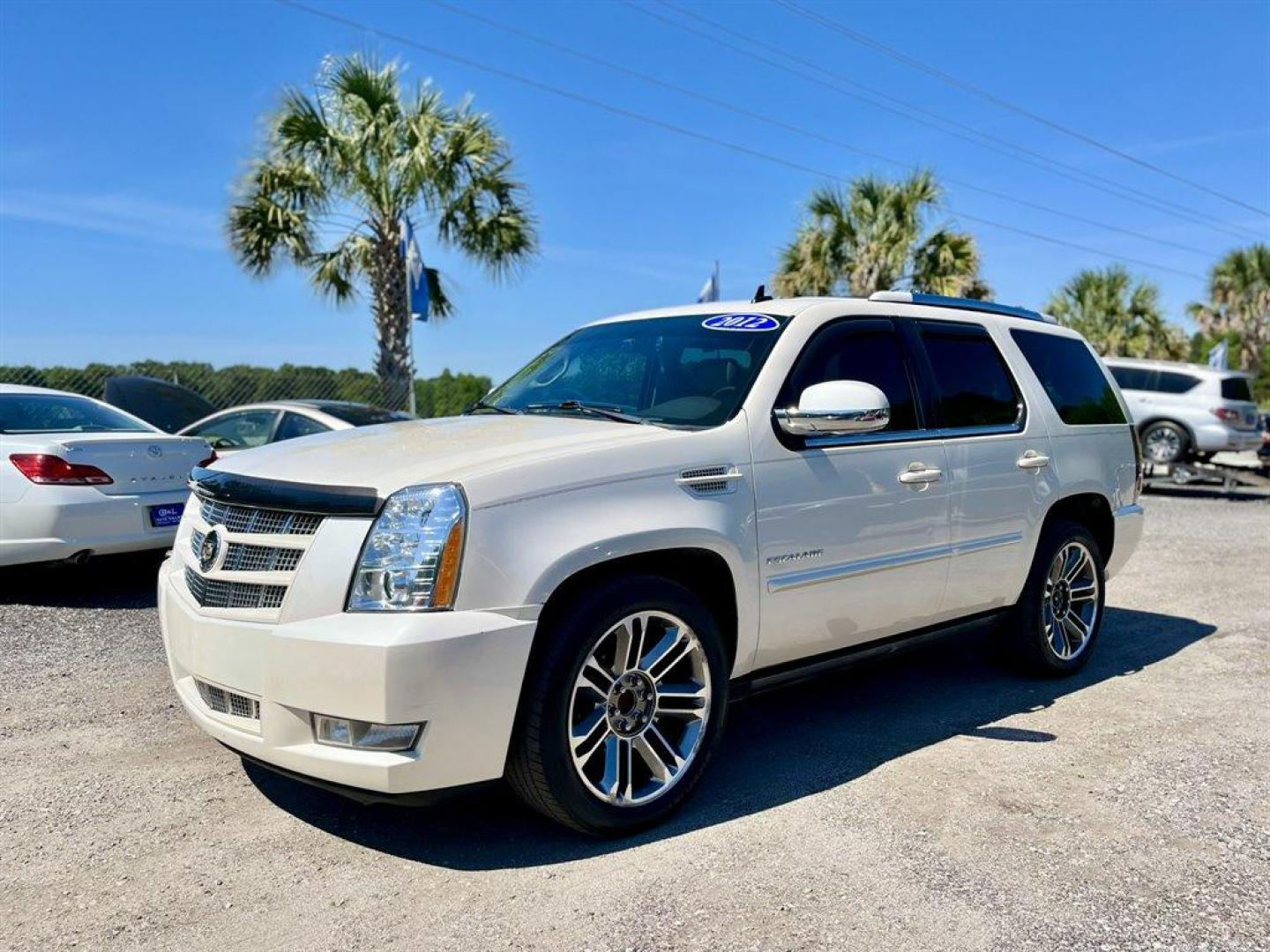 2012 White /Tan Cadillac Escalade (1GYS3CEFXCR) with an 6.2l V8 SFI OHV Flex 6.2l engine, Automatic transmission, located at 745 East Steele Rd., West Columbia, SC, 29170, (803) 755-9148, 33.927212, -81.148483 - Special Internet Price! 2012 Cadillac Escalade Premium with Bluetooth, AM/FM radio, Cruise control, Backup camera, Navigation, Sunroof, Leather interior, Powered front seats, 3rd row seating, Rear entertainment, Powered windows, Powered door locks, Plus more! - Photo#0