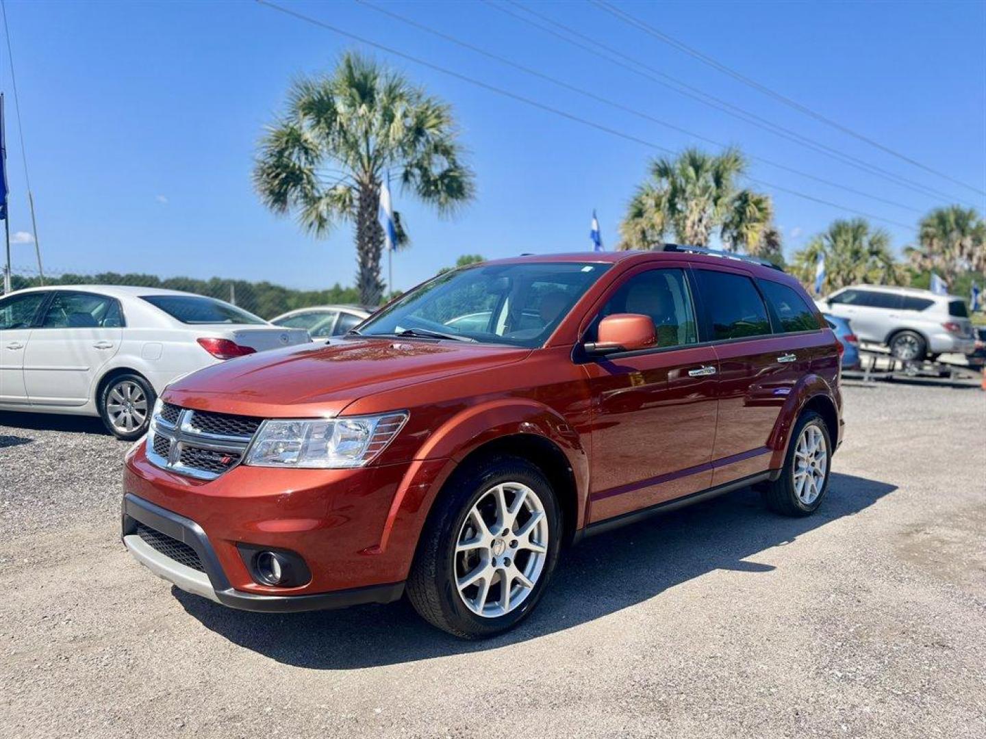 2014 Orange /Tan Dodge Journey (3C4PDCDG7ET) with an 3.6l V6 MPI Dohc VVT Flex engine, Automatic transmission, located at 745 East Steele Rd., West Columbia, SC, 29170, (803) 755-9148, 33.927212, -81.148483 - Special Internet Price! 2014 Dodge Journey Limited with Bluetooth, Backup camera, Cruise control, Leather interior, Push to start, Keyless entry, Powered windows, Powered door locks, Plus more! - Photo#0