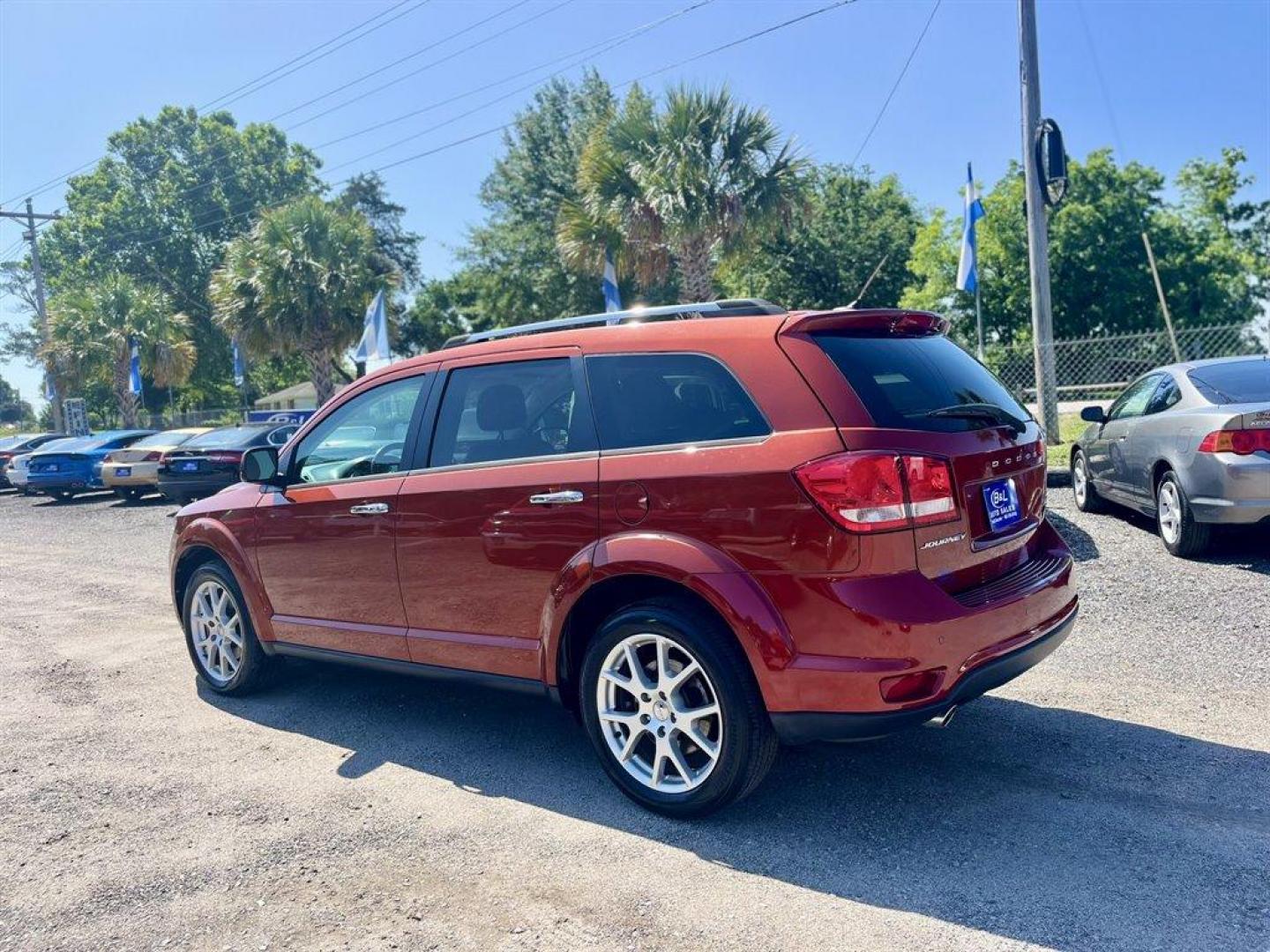 2014 Orange /Tan Dodge Journey (3C4PDCDG7ET) with an 3.6l V6 MPI Dohc VVT Flex engine, Automatic transmission, located at 745 East Steele Rd., West Columbia, SC, 29170, (803) 755-9148, 33.927212, -81.148483 - Special Internet Price! 2014 Dodge Journey Limited with Bluetooth, Backup camera, Cruise control, Leather interior, Push to start, Keyless entry, Powered windows, Powered door locks, Plus more! - Photo#1