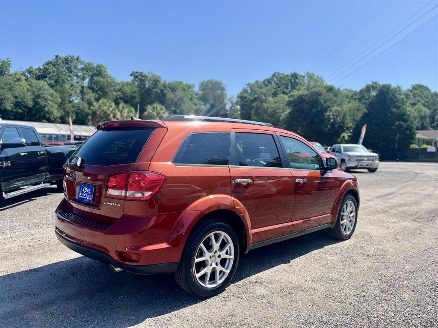 2014 Orange /Tan Dodge Journey (3C4PDCDG7ET) with an 3.6l V6 MPI Dohc VVT Flex engine, Automatic transmission, located at 745 East Steele Rd., West Columbia, SC, 29170, (803) 755-9148, 33.927212, -81.148483 - Special Internet Price! 2014 Dodge Journey Limited with Bluetooth, Backup camera, Cruise control, Leather interior, Push to start, Keyless entry, Powered windows, Powered door locks, Plus more! - Photo#2