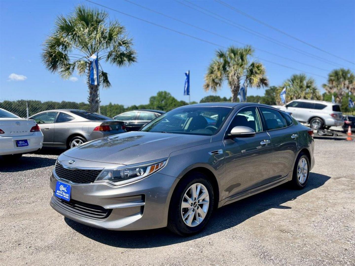 2016 Grey /Black Kia Optima (5XXGT4L34GG) with an 2.4l I-4 DI Dohc 2.4l engine, Automatic transmission, located at 745 East Steele Rd., West Columbia, SC, 29170, (803) 755-9148, 33.927212, -81.148483 - Special Internet Price! 2016 Kia Optima with Bluetooth, AM/FM radio, Cruise control, Backup camera, Keyless entry, Cloth interior, Powered windows, Powered door locks, Plus more! - Photo#0