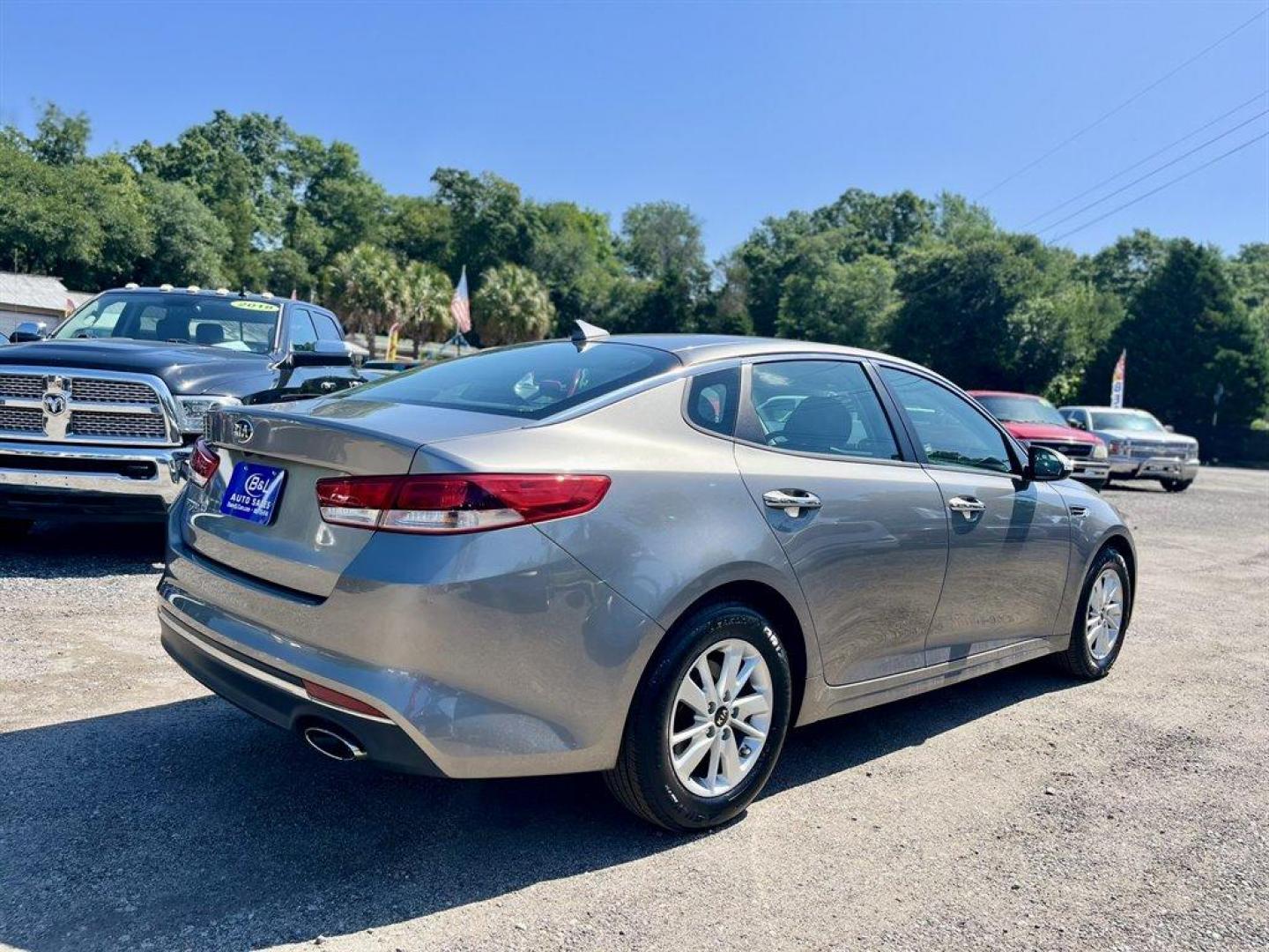 2016 Grey /Black Kia Optima (5XXGT4L34GG) with an 2.4l I-4 DI Dohc 2.4l engine, Automatic transmission, located at 745 East Steele Rd., West Columbia, SC, 29170, (803) 755-9148, 33.927212, -81.148483 - Special Internet Price! 2016 Kia Optima with Bluetooth, AM/FM radio, Cruise control, Backup camera, Keyless entry, Cloth interior, Powered windows, Powered door locks, Plus more! - Photo#2