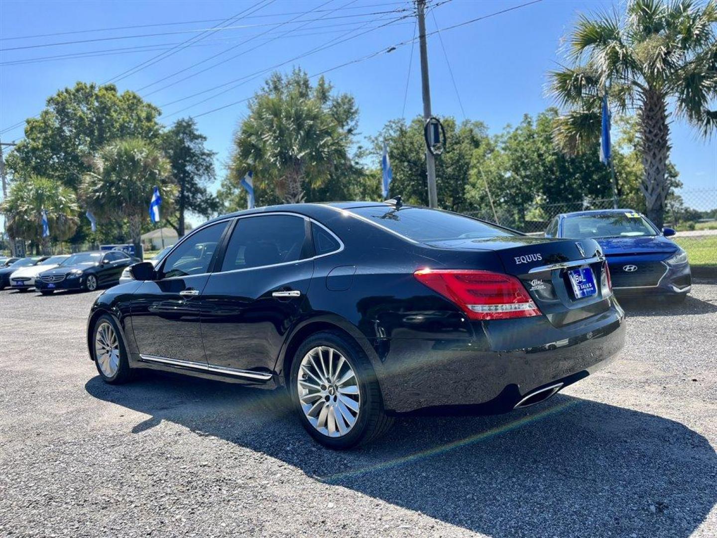 2014 Black /Taupe Hyundai Equus (KMHGH4JH5EU) with an 5.0l V8 DI Dohc Cvvt 5.0l engine, Automatic transmission, located at 745 East Steele Rd., West Columbia, SC, 29170, (803) 755-9148, 33.927212, -81.148483 - Special Internet Price! 2014 Hyundai Equus with AM/FM radio, Backup camera, Navigation, Sunroof, Keyless entry, Leather interior, Powered seats, Powered windows, Plus more! - Photo#1