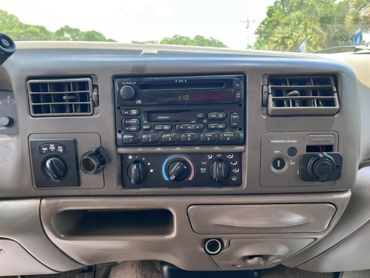 2000 White /Tan Ford F250sd (1FTNX21S7YE) with an 6.8l V10 EFI 6.8l engine, Automatic transmission, located at 745 East Steele Rd., West Columbia, SC, 29170, (803) 755-9148, 33.927212, -81.148483 - Special Internet Price! 2000 Ford F250sd Lariat with AM/FM radio, Cruise control, Air conditioning, Leather interior, Rear split fold up bench seat, Powered windows, Powered door locks, Plus more! - Photo#12