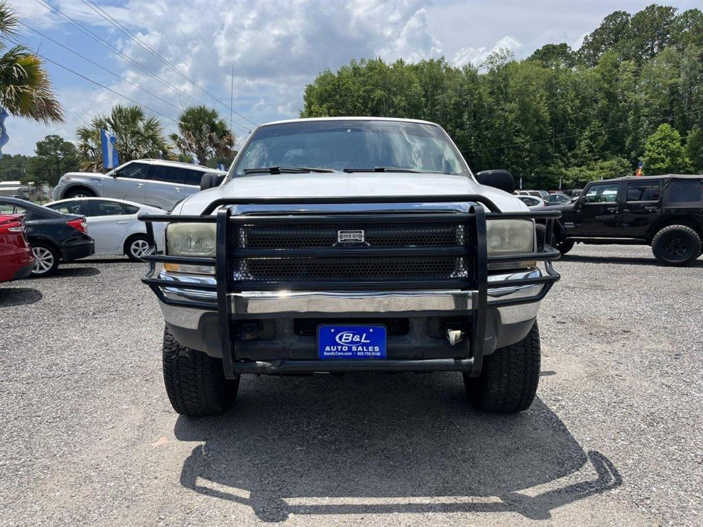 2000 White /Tan Ford F250sd (1FTNX21S7YE) with an 6.8l V10 EFI 6.8l engine, Automatic transmission, located at 745 East Steele Rd., West Columbia, SC, 29170, (803) 755-9148, 33.927212, -81.148483 - Special Internet Price! 2000 Ford F250sd Lariat with AM/FM radio, Cruise control, Air conditioning, Leather interior, Rear split fold up bench seat, Powered windows, Powered door locks, Plus more! - Photo#4