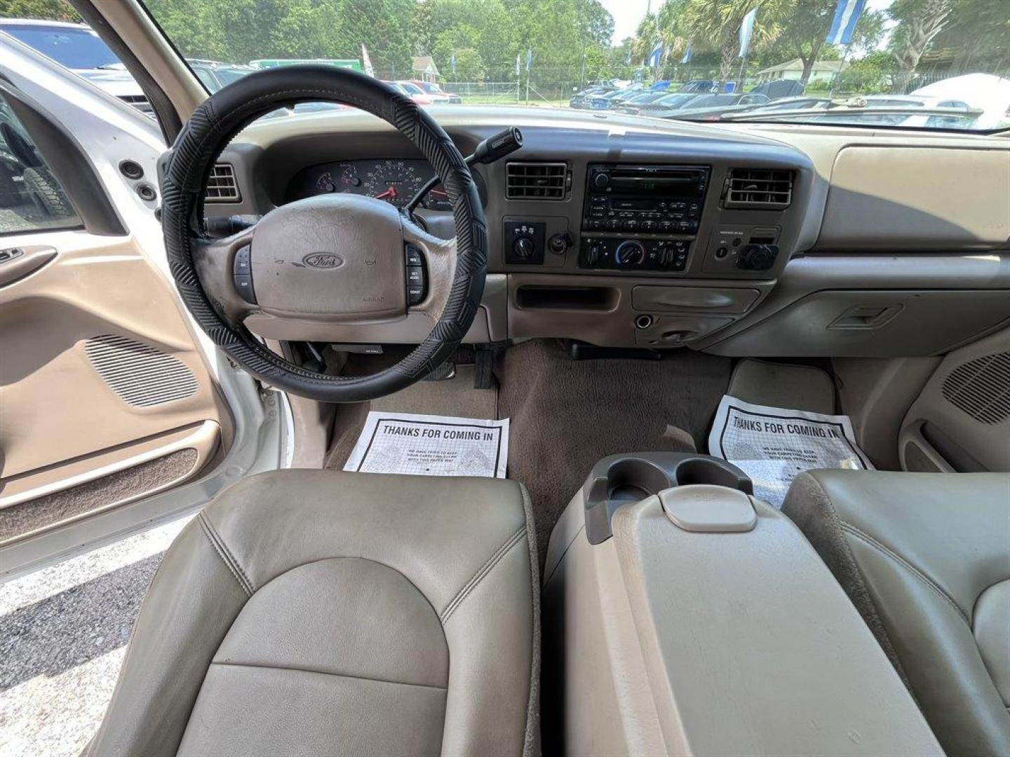 2000 White /Tan Ford F250sd (1FTNX21S7YE) with an 6.8l V10 EFI 6.8l engine, Automatic transmission, located at 745 East Steele Rd., West Columbia, SC, 29170, (803) 755-9148, 33.927212, -81.148483 - Special Internet Price! 2000 Ford F250sd Lariat with AM/FM radio, Cruise control, Air conditioning, Leather interior, Rear split fold up bench seat, Powered windows, Powered door locks, Plus more! - Photo#5