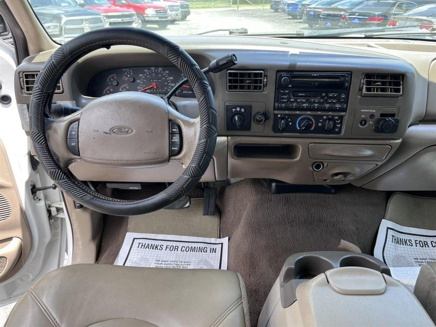 2000 White /Tan Ford F250sd (1FTNX21S7YE) with an 6.8l V10 EFI 6.8l engine, Automatic transmission, located at 745 East Steele Rd., West Columbia, SC, 29170, (803) 755-9148, 33.927212, -81.148483 - Special Internet Price! 2000 Ford F250sd Lariat with AM/FM radio, Cruise control, Air conditioning, Leather interior, Rear split fold up bench seat, Powered windows, Powered door locks, Plus more! - Photo#6