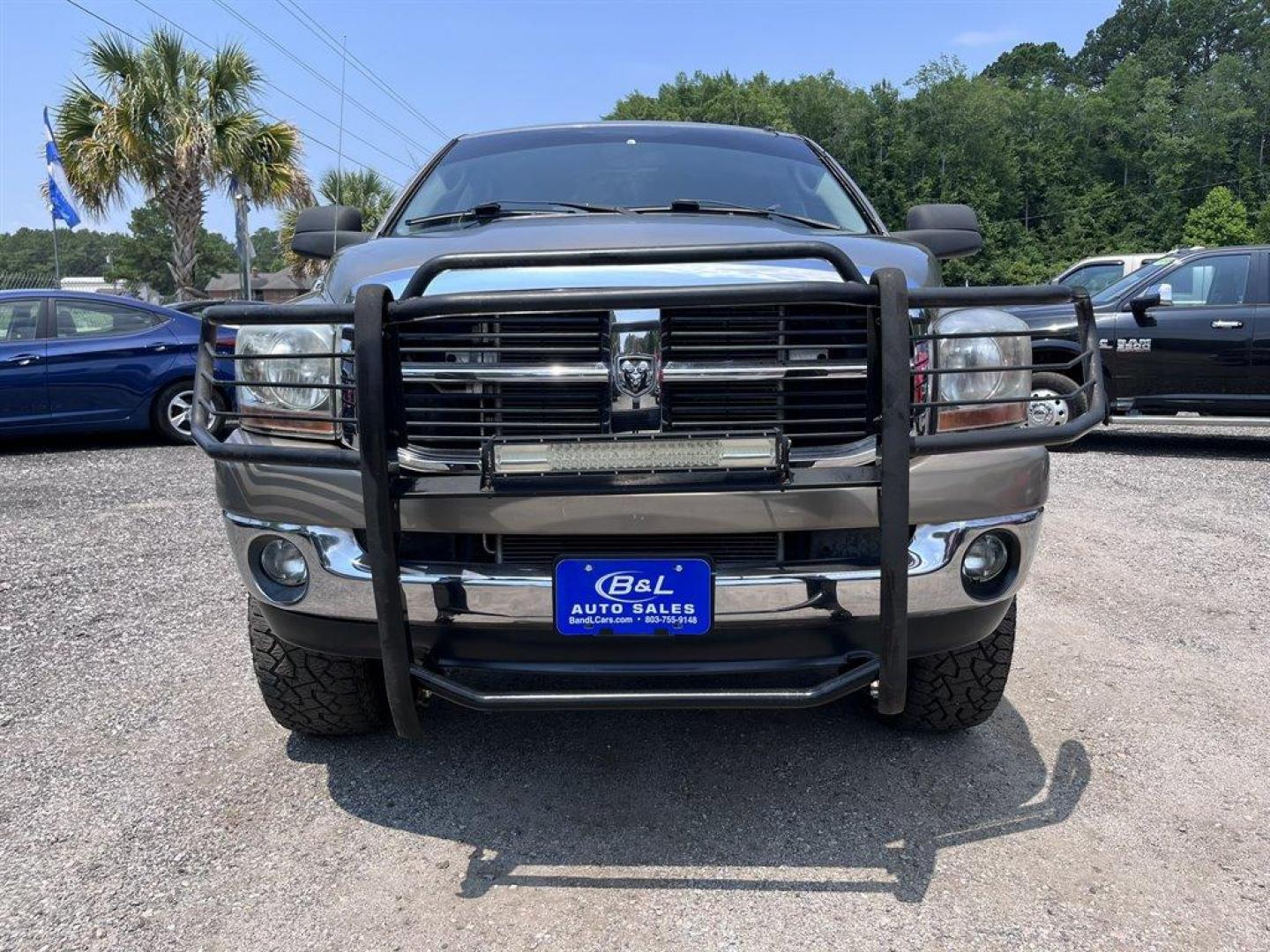 2007 Gold /Tan Dodge RAM 2500 (3D7KS29C87G) with an 5.9l I-6 FI DSL T/C HO 5. engine, Automatic transmission, located at 745 East Steele Rd., West Columbia, SC, 29170, (803) 755-9148, 33.927212, -81.148483 - Special Internet Price! 2007 Dodge RAM 2500 SLT with AM/FM radio, Cruise control, Manual air conditioning, Cloth interior, Powered driver seat, Rear split bench seat, Rear entertainment, Powered windows, Powered door locks, Plus more! - Photo#1