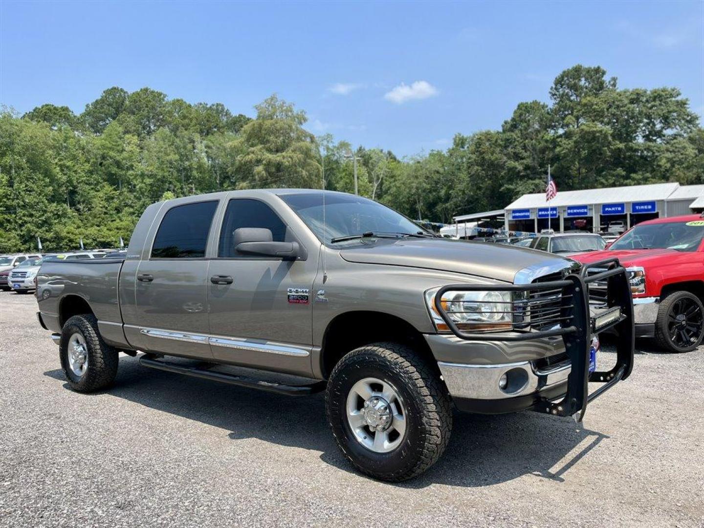 2007 Gold /Tan Dodge RAM 2500 (3D7KS29C87G) with an 5.9l I-6 FI DSL T/C HO 5. engine, Automatic transmission, located at 745 East Steele Rd., West Columbia, SC, 29170, (803) 755-9148, 33.927212, -81.148483 - Special Internet Price! 2007 Dodge RAM 2500 SLT with AM/FM radio, Cruise control, Manual air conditioning, Cloth interior, Powered driver seat, Rear split bench seat, Rear entertainment, Powered windows, Powered door locks, Plus more! - Photo#2