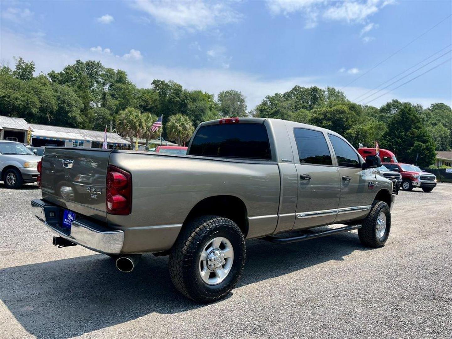 2007 Gold /Tan Dodge RAM 2500 (3D7KS29C87G) with an 5.9l I-6 FI DSL T/C HO 5. engine, Automatic transmission, located at 745 East Steele Rd., West Columbia, SC, 29170, (803) 755-9148, 33.927212, -81.148483 - Special Internet Price! 2007 Dodge RAM 2500 SLT with AM/FM radio, Cruise control, Manual air conditioning, Cloth interior, Powered driver seat, Rear split bench seat, Rear entertainment, Powered windows, Powered door locks, Plus more! - Photo#3