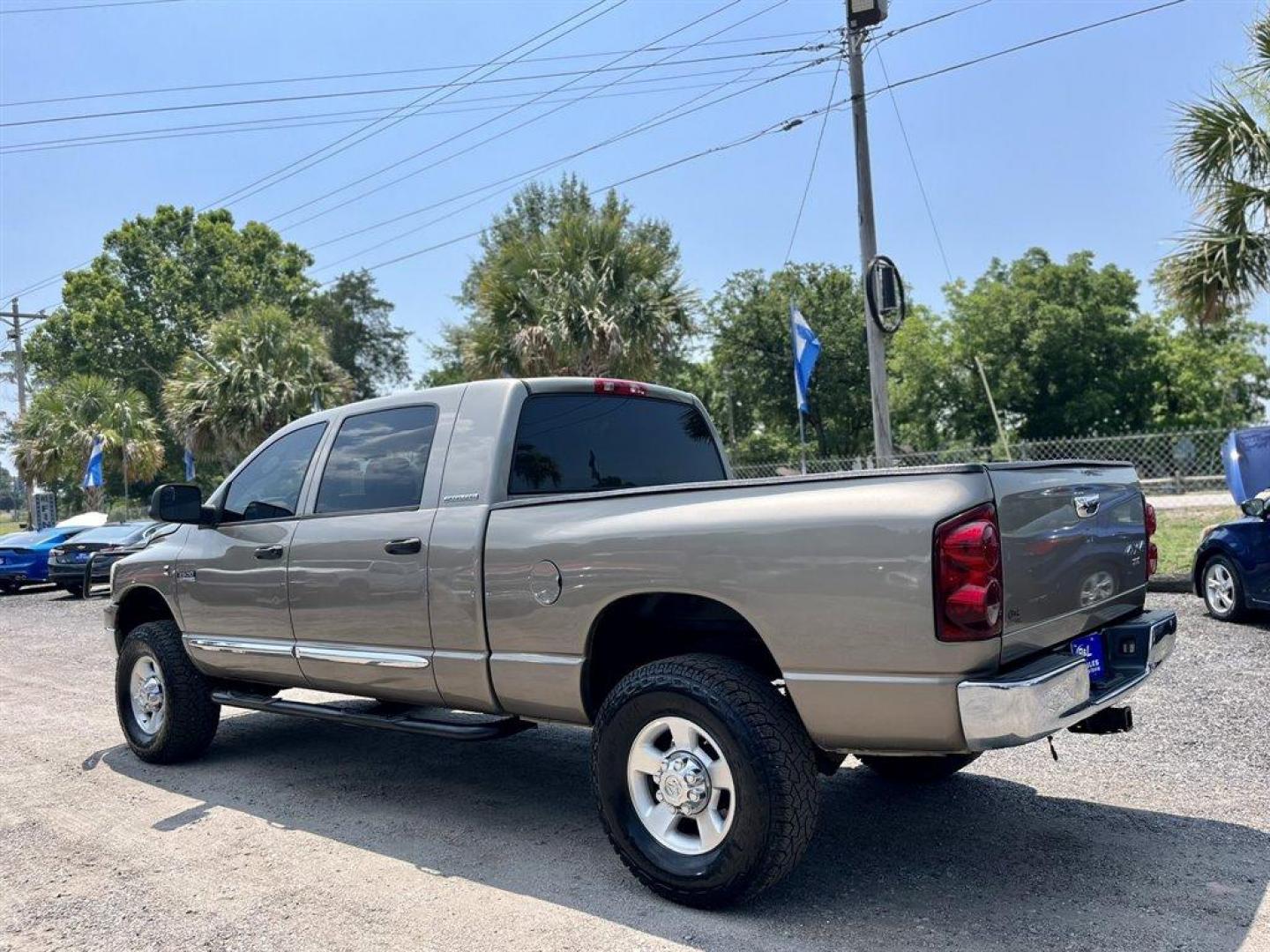 2007 Gold /Tan Dodge RAM 2500 (3D7KS29C87G) with an 5.9l I-6 FI DSL T/C HO 5. engine, Automatic transmission, located at 745 East Steele Rd., West Columbia, SC, 29170, (803) 755-9148, 33.927212, -81.148483 - Special Internet Price! 2007 Dodge RAM 2500 SLT with AM/FM radio, Cruise control, Manual air conditioning, Cloth interior, Powered driver seat, Rear split bench seat, Rear entertainment, Powered windows, Powered door locks, Plus more! - Photo#5