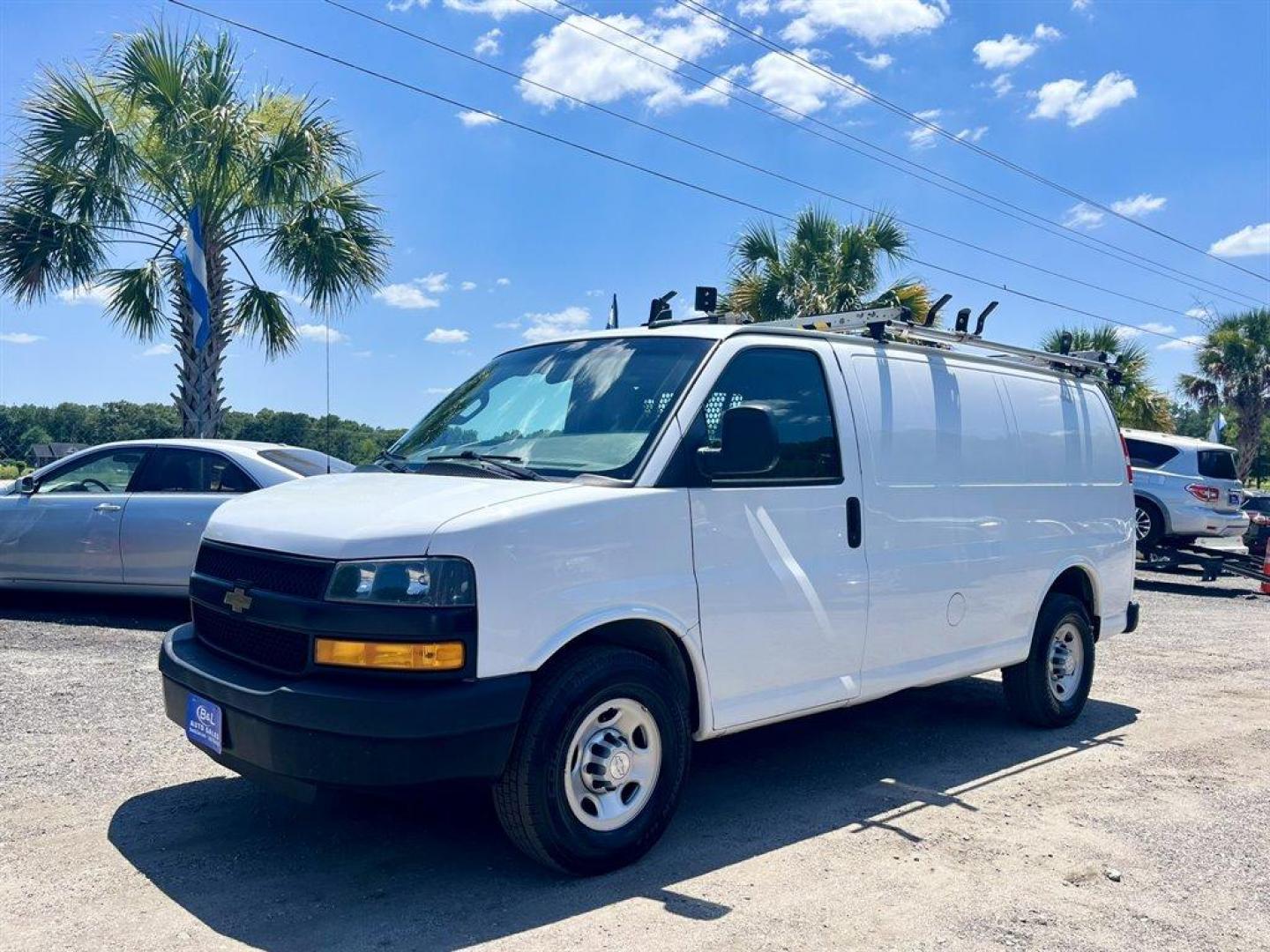 2018 White /Grey Chevrolet Express Cargo (1GCWGAFGXJ1) with an 6.0l V8 SFI OHV Flex 6.0l engine, Automatic transmission, located at 745 East Steele Rd., West Columbia, SC, 29170, (803) 755-9148, 33.927212, -81.148483 - Special Internet Price! 2018 Chevrolet Express Cargo G2500 with AM/FM radio, Backup camera, Leather interior, Roof rack, Plenty of storage, Powered windows, Powered door locks, Plus more! - Photo#0