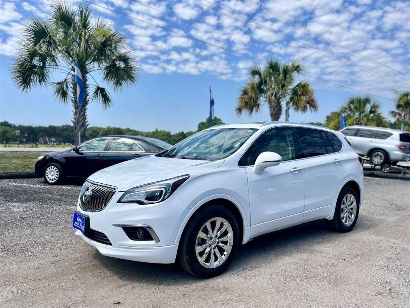 2017 White /Tan Buick Envision (LRBFXBSA4HD) with an 2.5l I-4 DI Dohc VVT Flex engine, Automatic transmission, located at 745 East Steele Rd., West Columbia, SC, 29170, (803) 755-9148, 33.927212, -81.148483 - Special Internet Price! 2017 Buick Envision Essence with Bluetooth, Backup camera, Navigation, Cruise control, Automatic air conditioning, Leather interior, Panoramic sunroof, Powered front seats, Keyless entry, Push to start, Powered liftgate, Powered windows, Powered door locks, Plus more! - Photo#0