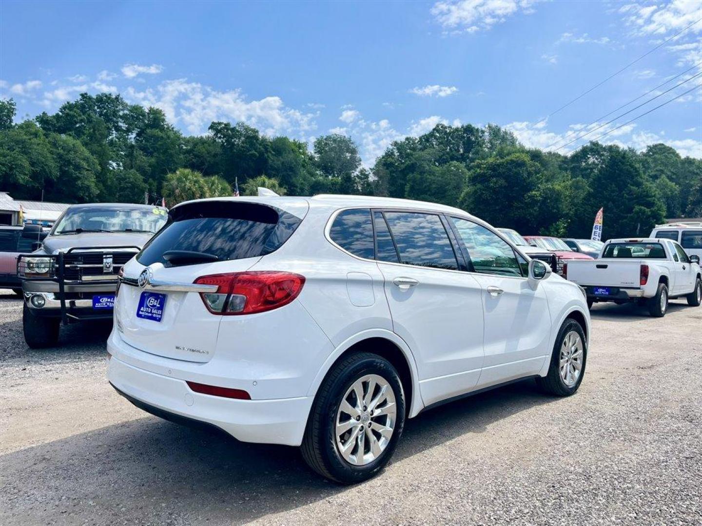 2017 White /Tan Buick Envision (LRBFXBSA4HD) with an 2.5l I-4 DI Dohc VVT Flex engine, Automatic transmission, located at 745 East Steele Rd., West Columbia, SC, 29170, (803) 755-9148, 33.927212, -81.148483 - Special Internet Price! 2017 Buick Envision Essence with Bluetooth, Backup camera, Navigation, Cruise control, Automatic air conditioning, Leather interior, Panoramic sunroof, Powered front seats, Keyless entry, Push to start, Powered liftgate, Powered windows, Powered door locks, Plus more! - Photo#2