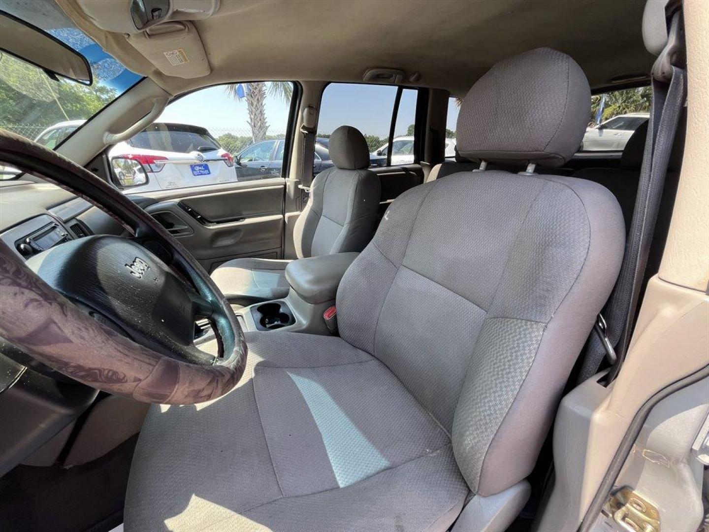 2004 Silver /Grey Jeep Grand Cherokee (1J4GX48S94C) with an 4.0l I-6 MPI 4.0l engine, Automatic transmission, located at 745 East Steele Rd., West Columbia, SC, 29170, (803) 755-9148, 33.927212, -81.148483 - Special Internet Price! 2004 Jeep Grand Cherokee Laredo with AM/FM radio, Cruise control, Manual air conditioning, Powered driver seat, Cloth interior, Rear split bench seat, Powered windows, Powered door locks, Plus more! - Photo#13