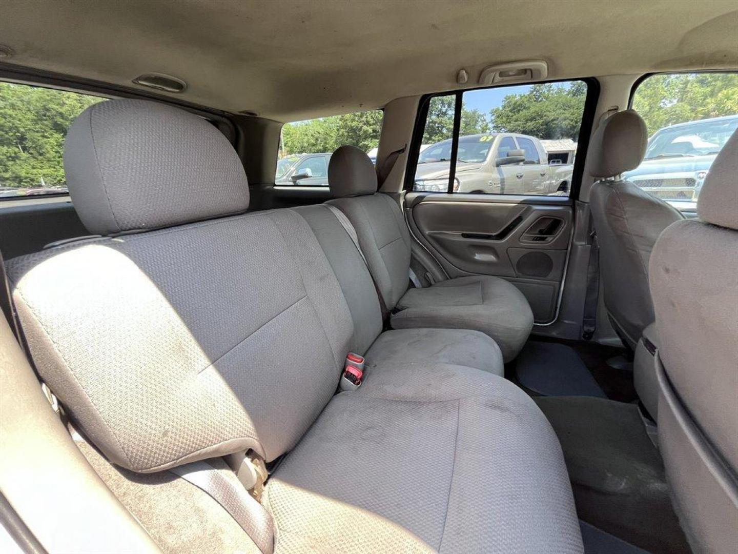 2004 Silver /Grey Jeep Grand Cherokee (1J4GX48S94C) with an 4.0l I-6 MPI 4.0l engine, Automatic transmission, located at 745 East Steele Rd., West Columbia, SC, 29170, (803) 755-9148, 33.927212, -81.148483 - Special Internet Price! 2004 Jeep Grand Cherokee Laredo with AM/FM radio, Cruise control, Manual air conditioning, Powered driver seat, Cloth interior, Rear split bench seat, Powered windows, Powered door locks, Plus more! - Photo#18