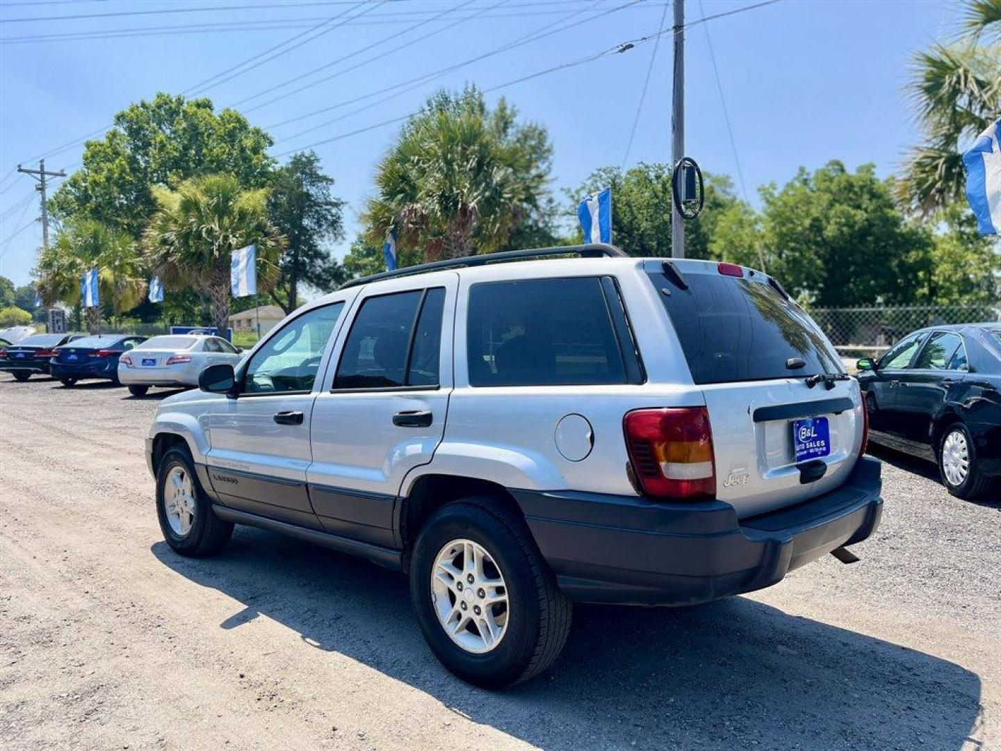 2004 Silver /Grey Jeep Grand Cherokee (1J4GX48S94C) with an 4.0l I-6 MPI 4.0l engine, Automatic transmission, located at 745 East Steele Rd., West Columbia, SC, 29170, (803) 755-9148, 33.927212, -81.148483 - Special Internet Price! 2004 Jeep Grand Cherokee Laredo with AM/FM radio, Cruise control, Manual air conditioning, Powered driver seat, Cloth interior, Rear split bench seat, Powered windows, Powered door locks, Plus more! - Photo#1