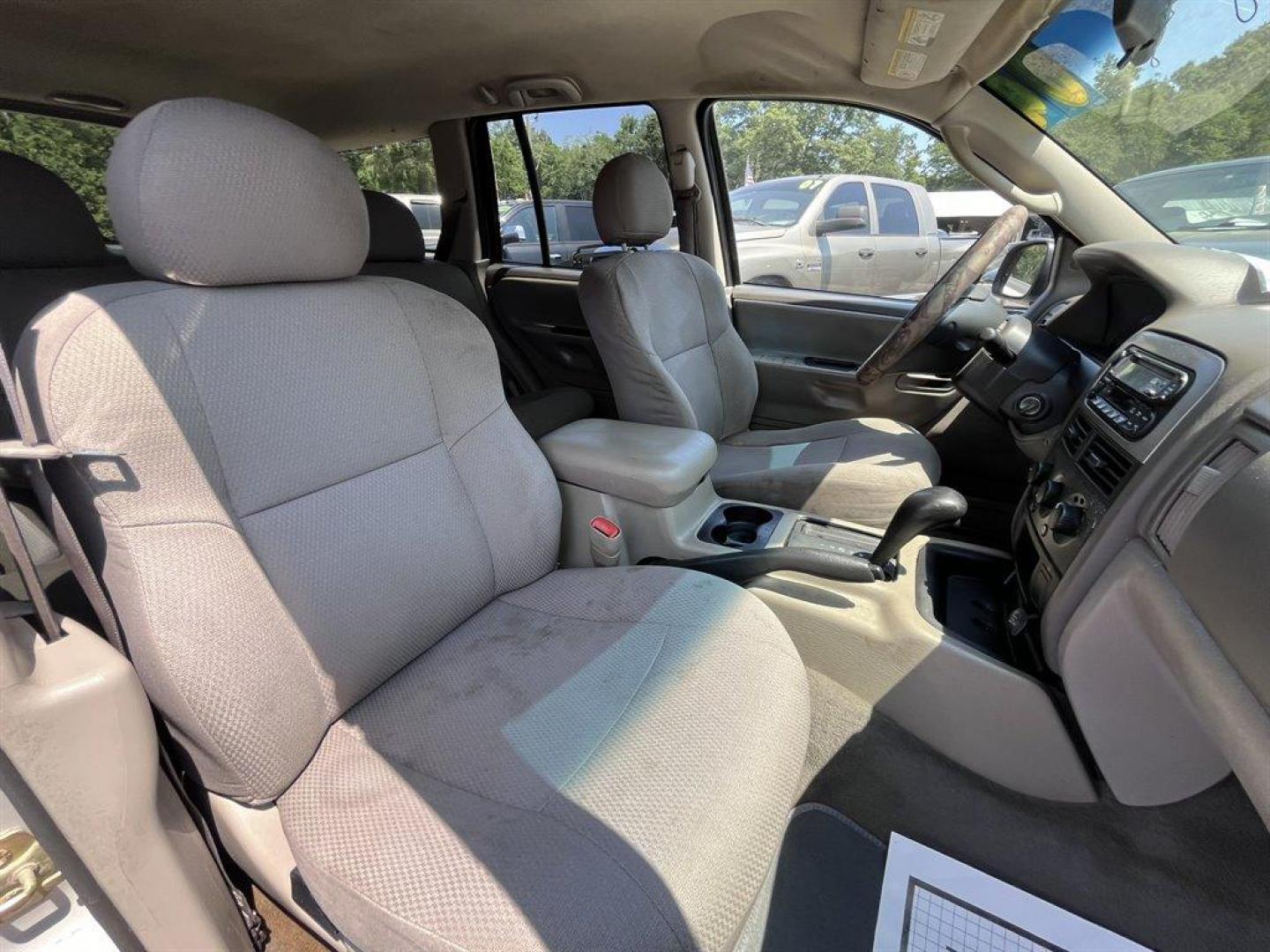 2004 Silver /Grey Jeep Grand Cherokee (1J4GX48S94C) with an 4.0l I-6 MPI 4.0l engine, Automatic transmission, located at 745 East Steele Rd., West Columbia, SC, 29170, (803) 755-9148, 33.927212, -81.148483 - Special Internet Price! 2004 Jeep Grand Cherokee Laredo with AM/FM radio, Cruise control, Manual air conditioning, Powered driver seat, Cloth interior, Rear split bench seat, Powered windows, Powered door locks, Plus more! - Photo#20