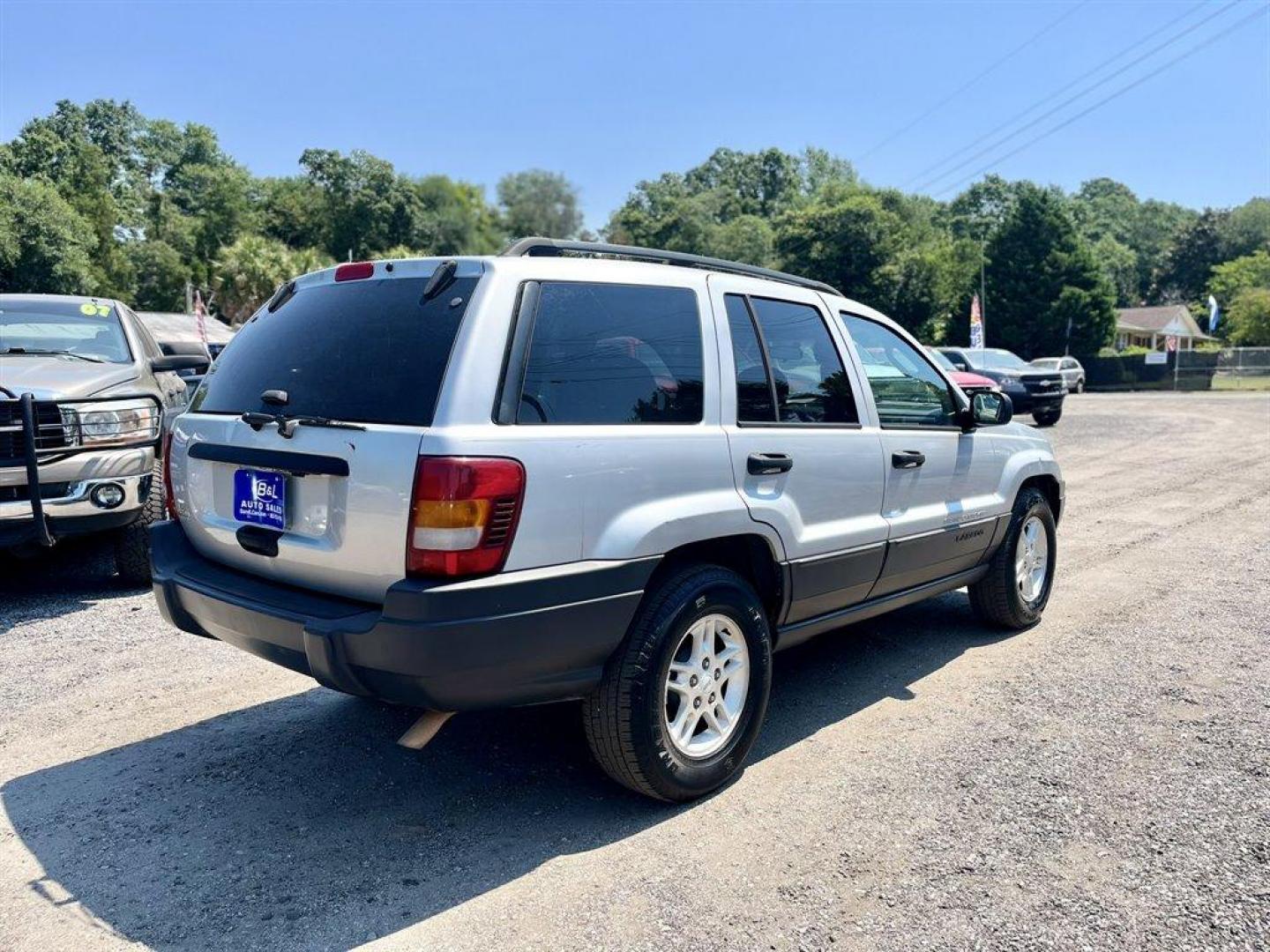 2004 Silver /Grey Jeep Grand Cherokee (1J4GX48S94C) with an 4.0l I-6 MPI 4.0l engine, Automatic transmission, located at 745 East Steele Rd., West Columbia, SC, 29170, (803) 755-9148, 33.927212, -81.148483 - Special Internet Price! 2004 Jeep Grand Cherokee Laredo with AM/FM radio, Cruise control, Manual air conditioning, Powered driver seat, Cloth interior, Rear split bench seat, Powered windows, Powered door locks, Plus more! - Photo#2