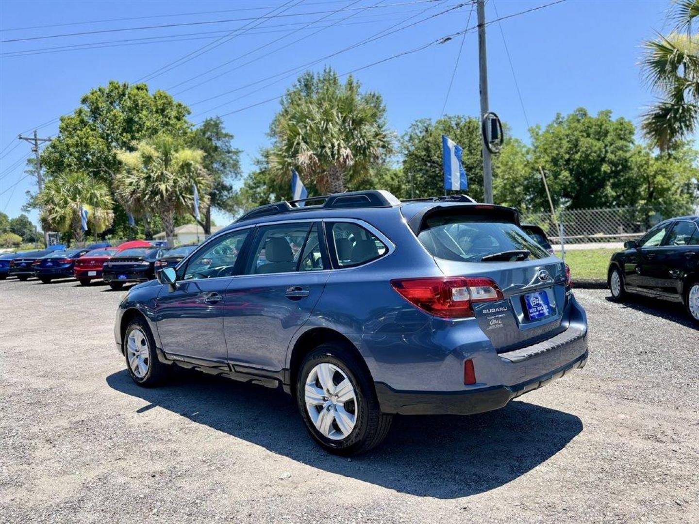 2015 Blue /Tan Subaru Outback (4S4BSAAC7F3) with an 2.5l H-4 MPI Sohc 2.5l engine, Automatic transmission, located at 745 East Steele Rd., West Columbia, SC, 29170, (803) 755-9148, 33.927212, -81.148483 - Special Internet Price! 2015 Subaru Outback Base with AM/FM, Cruise control, Backup camera, Keyless entry, Air conditioning, Cloth interior, Powered windows, Powered door locks, Plus more! - Photo#1