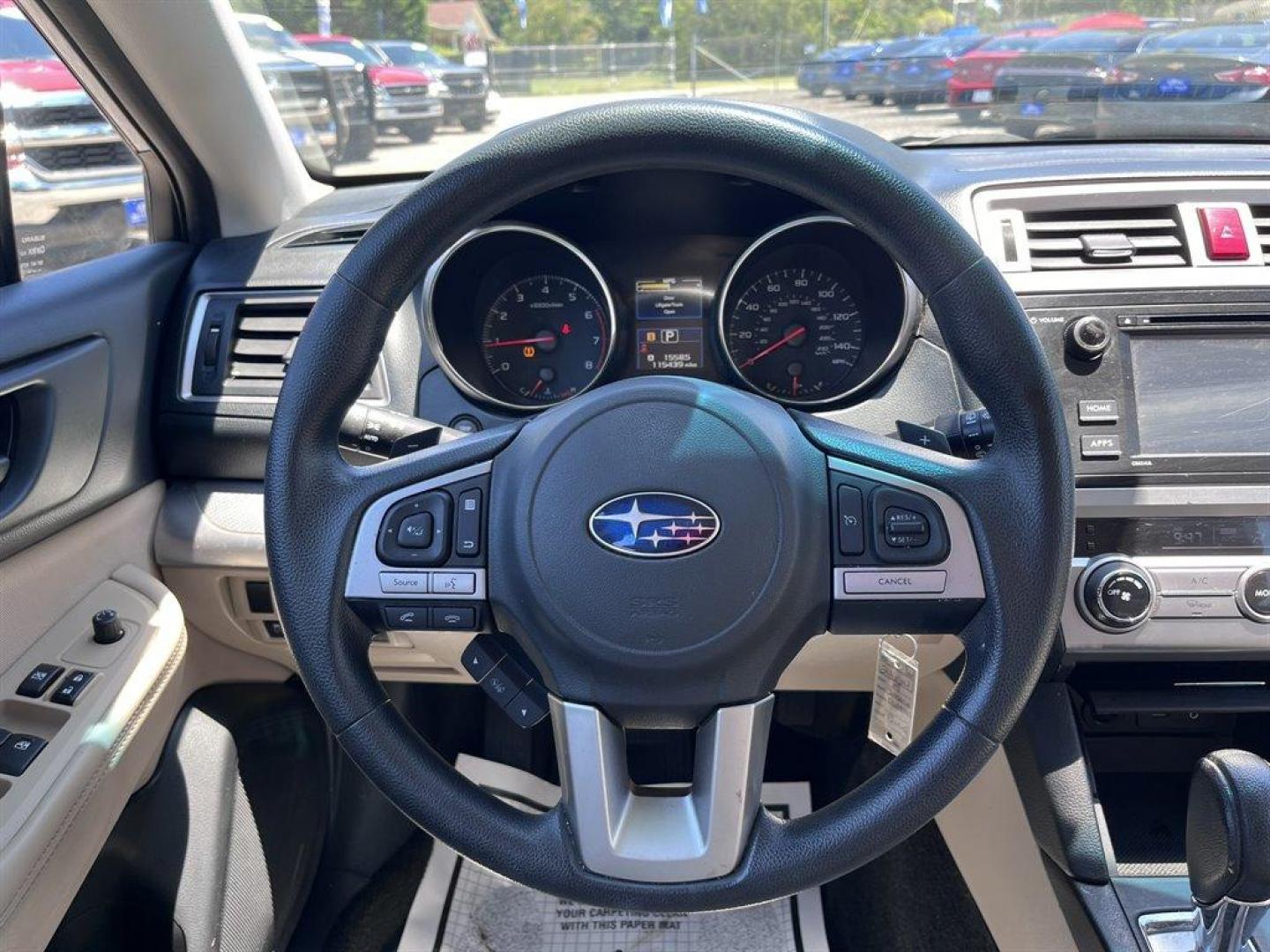 2015 Blue /Tan Subaru Outback (4S4BSAAC7F3) with an 2.5l H-4 MPI Sohc 2.5l engine, Automatic transmission, located at 745 East Steele Rd., West Columbia, SC, 29170, (803) 755-9148, 33.927212, -81.148483 - Special Internet Price! 2015 Subaru Outback Base with AM/FM, Cruise control, Backup camera, Keyless entry, Air conditioning, Cloth interior, Powered windows, Powered door locks, Plus more! - Photo#5