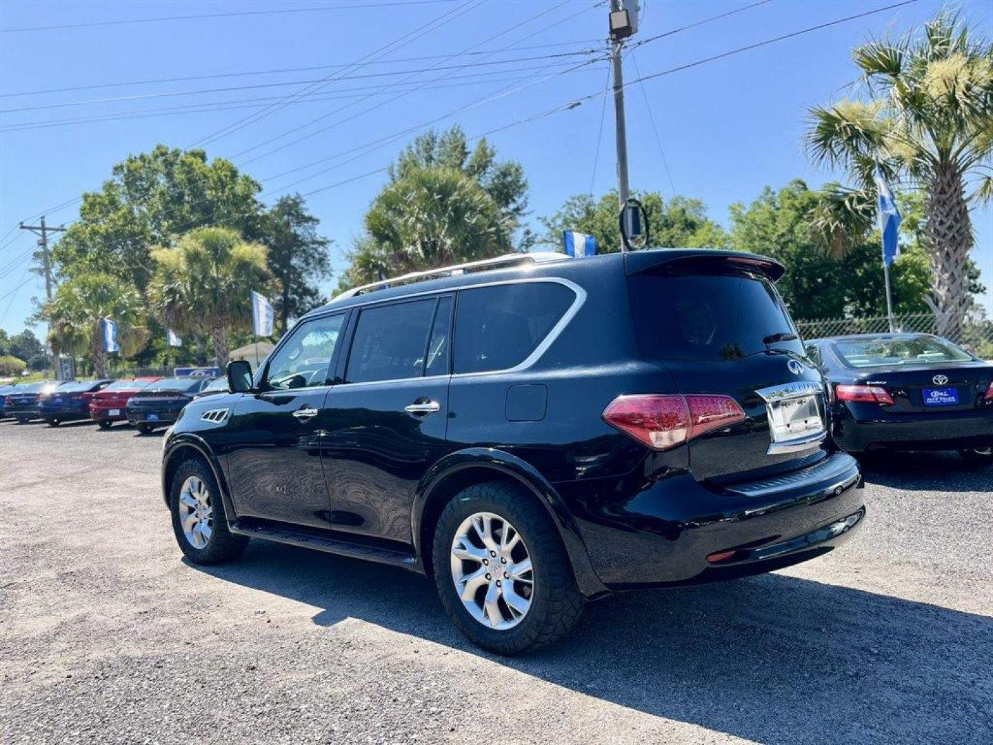 2013 Black /Black Infiniti QX56 (JN8AZ2NE5D9) with an 5.6l V8 DI Dohc Cvtcs 5.6 engine, Automatic transmission, located at 745 East Steele Rd., West Columbia, SC, 29170, (803) 755-9148, 33.927212, -81.148483 - Special Internet Price! 2013 Infiniti QX56 with AM/FM radio, Cruise control, Backup camera, Navigation, Sunroof, Leather interior, Dual rear headrest DVD entertainment, Heated front and 2nd row seats, Powered liftgate, 3rd row seating, Powered windows, Powered door locks, Plus more! - Photo#1