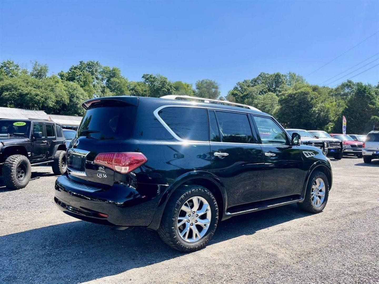 2013 Black /Black Infiniti QX56 (JN8AZ2NE5D9) with an 5.6l V8 DI Dohc Cvtcs 5.6 engine, Automatic transmission, located at 745 East Steele Rd., West Columbia, SC, 29170, (803) 755-9148, 33.927212, -81.148483 - Special Internet Price! 2013 Infiniti QX56 with AM/FM radio, Cruise control, Backup camera, Navigation, Sunroof, Leather interior, Dual rear headrest DVD entertainment, Heated front and 2nd row seats, Powered liftgate, 3rd row seating, Powered windows, Powered door locks, Plus more! - Photo#2