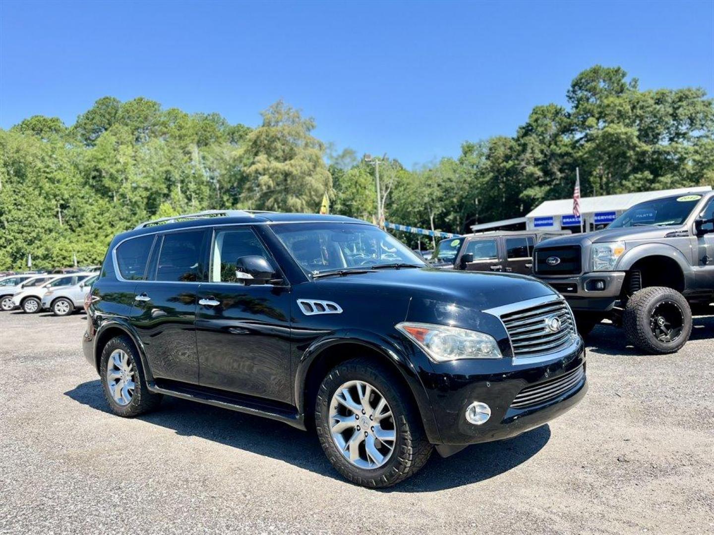 2013 Black /Black Infiniti QX56 (JN8AZ2NE5D9) with an 5.6l V8 DI Dohc Cvtcs 5.6 engine, Automatic transmission, located at 745 East Steele Rd., West Columbia, SC, 29170, (803) 755-9148, 33.927212, -81.148483 - Special Internet Price! 2013 Infiniti QX56 with AM/FM radio, Cruise control, Backup camera, Navigation, Sunroof, Leather interior, Dual rear headrest DVD entertainment, Heated front and 2nd row seats, Powered liftgate, 3rd row seating, Powered windows, Powered door locks, Plus more! - Photo#3