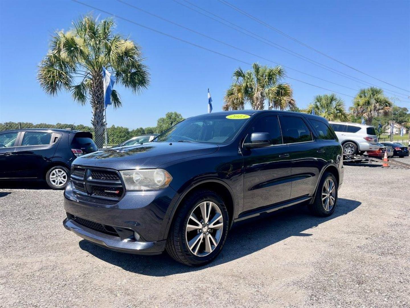 2013 Black /Black Dodge Durango (1C4RDHAG7DC) with an 3.6l V6 MPI Dohc 3.6l engine, Automatic transmission, located at 745 East Steele Rd., West Columbia, SC, 29170, (803) 755-9148, 33.927212, -81.148483 - Special Internet Price! 2013 Dodge Durango SXT with AM/FM radio, Cruise control, Keyless entry, Backup camera, Cloth interior, 3rd row seating, Air conditioning, Powered windows, Powered door locks, Plus more! - Photo#0