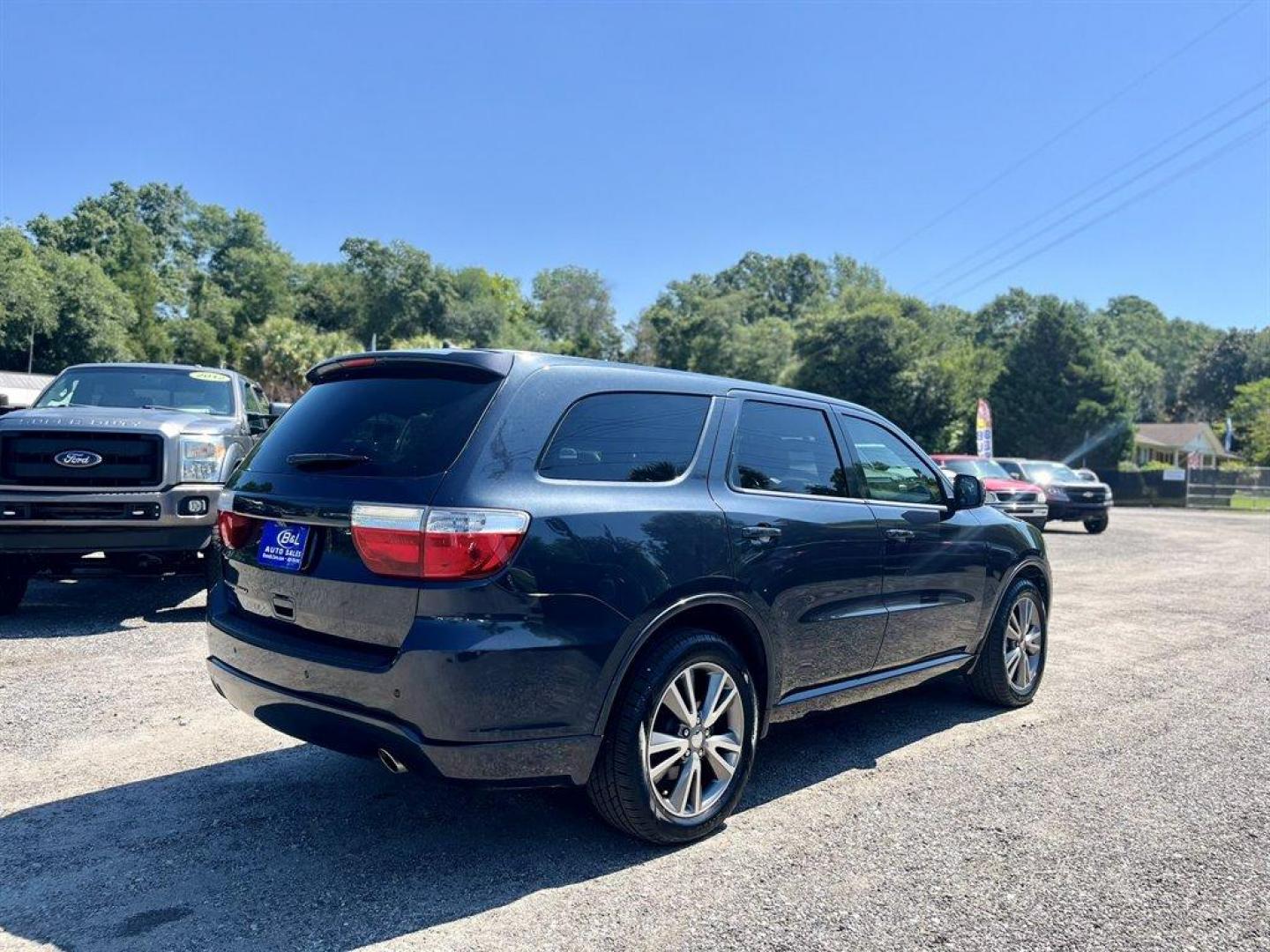 2013 Black /Black Dodge Durango (1C4RDHAG7DC) with an 3.6l V6 MPI Dohc 3.6l engine, Automatic transmission, located at 745 East Steele Rd., West Columbia, SC, 29170, (803) 755-9148, 33.927212, -81.148483 - Special Internet Price! 2013 Dodge Durango SXT with AM/FM radio, Cruise control, Keyless entry, Backup camera, Cloth interior, 3rd row seating, Air conditioning, Powered windows, Powered door locks, Plus more! - Photo#2