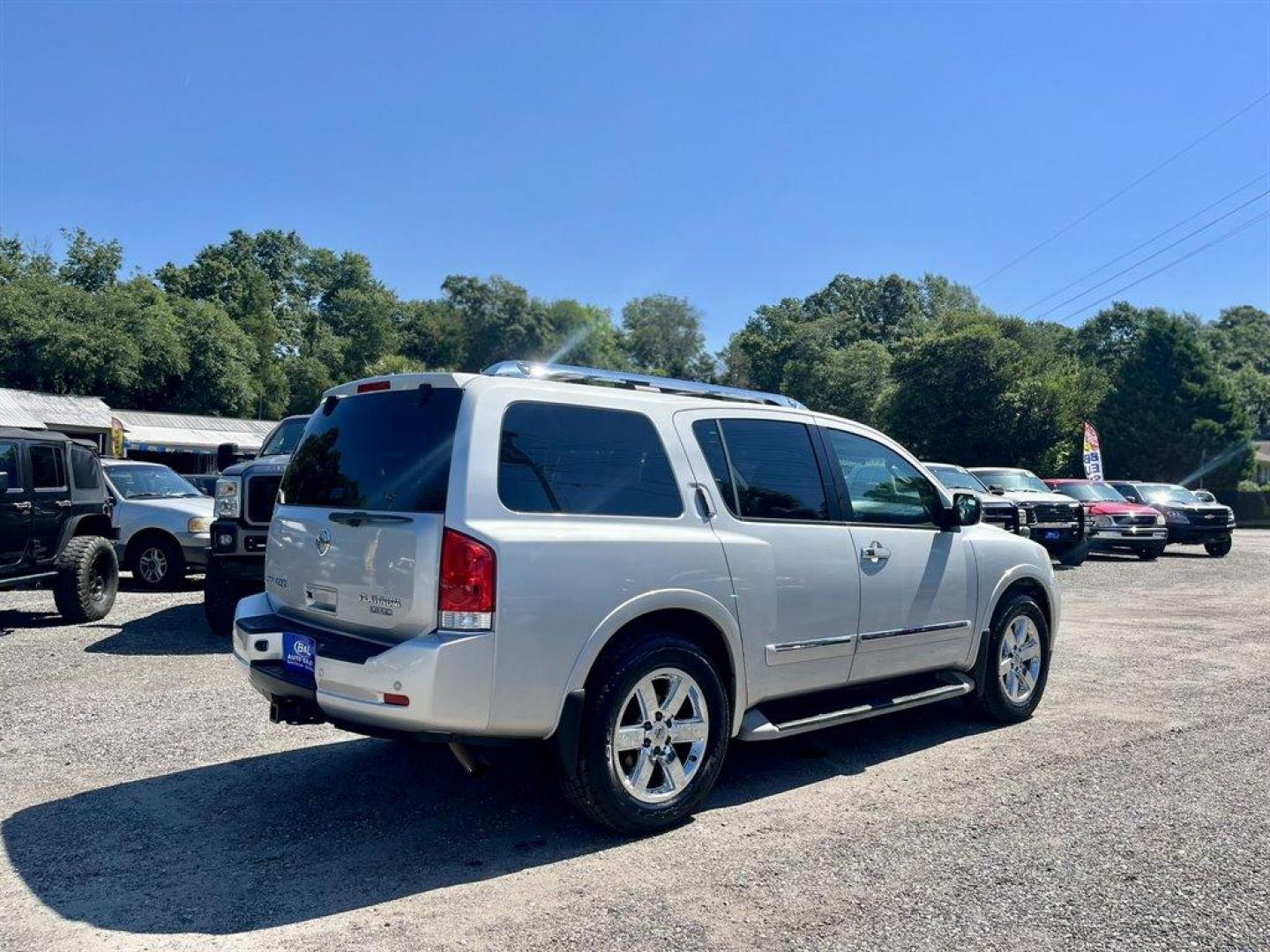 2012 Silver /Black Nissan Armada (5N1BA0NF4CN) with an 5.6l V8 MPI Dohc Flex 5.6 engine, Automatic transmission, located at 745 East Steele Rd., West Columbia, SC, 29170, (803) 755-9148, 33.927212, -81.148483 - Special Internet Price! 2012 Nissan Armada Platinum with AM/FM radio, Cruise control, Backup camera, Navigation, Sunroof, Leather interior, Heated front and 2nd row seats, Rear DVD entertainment, 3rd row seating, Powered front seats, Powered 3rd row, Powered liftgate, Powered windows, Powered door l - Photo#2