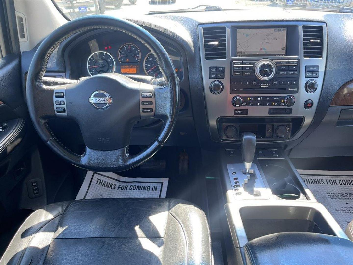 2012 Silver /Black Nissan Armada (5N1BA0NF4CN) with an 5.6l V8 MPI Dohc Flex 5.6 engine, Automatic transmission, located at 745 East Steele Rd., West Columbia, SC, 29170, (803) 755-9148, 33.927212, -81.148483 - Special Internet Price! 2012 Nissan Armada Platinum with AM/FM radio, Cruise control, Backup camera, Navigation, Sunroof, Leather interior, Heated front and 2nd row seats, Rear DVD entertainment, 3rd row seating, Powered front seats, Powered 3rd row, Powered liftgate, Powered windows, Powered door l - Photo#4