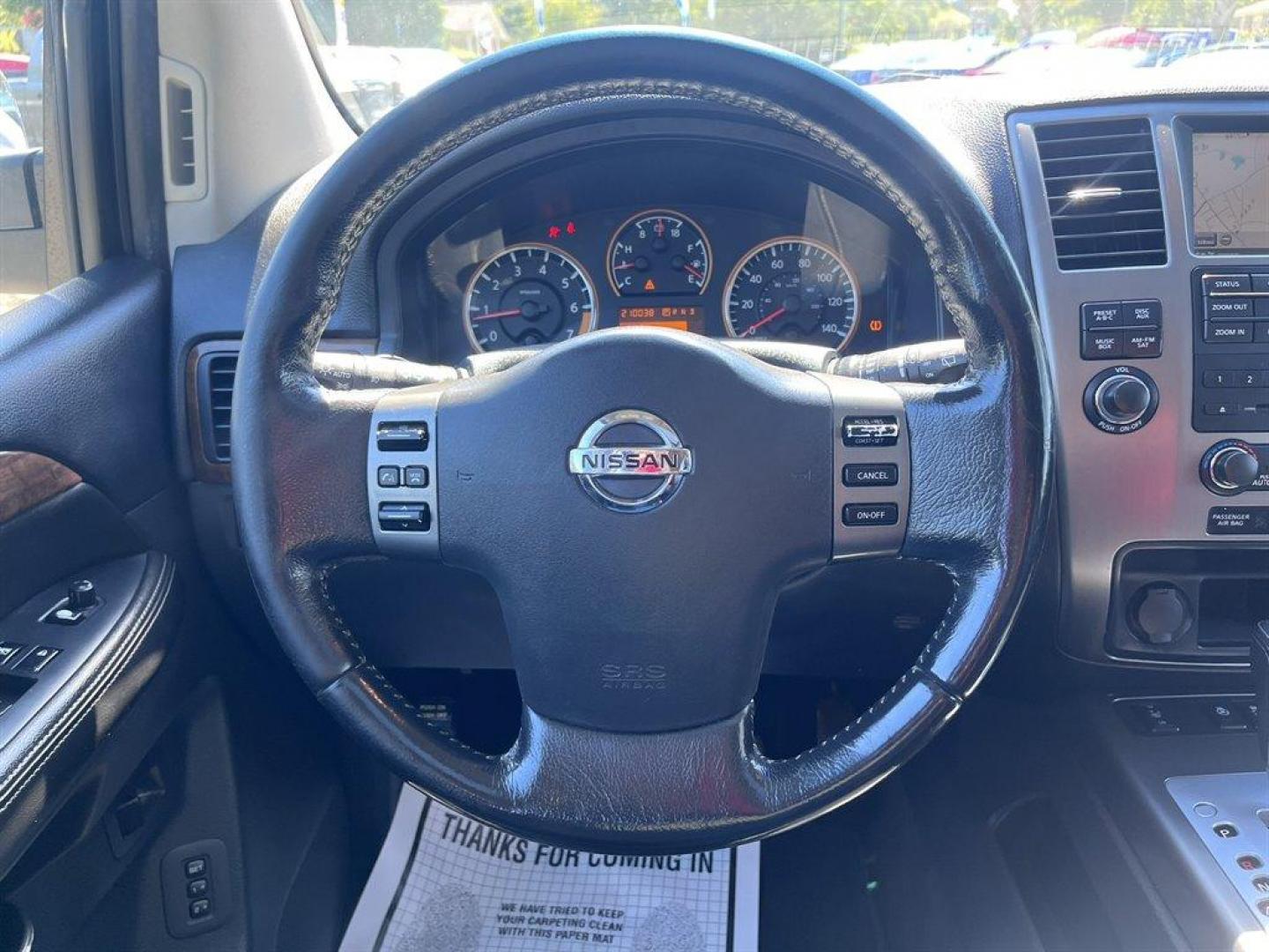 2012 Silver /Black Nissan Armada (5N1BA0NF4CN) with an 5.6l V8 MPI Dohc Flex 5.6 engine, Automatic transmission, located at 745 East Steele Rd., West Columbia, SC, 29170, (803) 755-9148, 33.927212, -81.148483 - Special Internet Price! 2012 Nissan Armada Platinum with AM/FM radio, Cruise control, Backup camera, Navigation, Sunroof, Leather interior, Heated front and 2nd row seats, Rear DVD entertainment, 3rd row seating, Powered front seats, Powered 3rd row, Powered liftgate, Powered windows, Powered door l - Photo#5