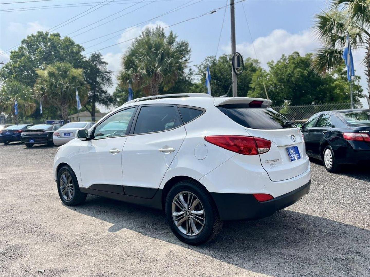 2015 White /Tan Hyundai Tucson (KM8JU3AG7FU) with an 2.4l I-4 DI Dohc 2.4l engine, Automatic transmission, located at 745 East Steele Rd., West Columbia, SC, 29170, (803) 755-9148, 33.927212, -81.148483 - Special Internet Price! 2015 Hyundai Tucson - Photo#1