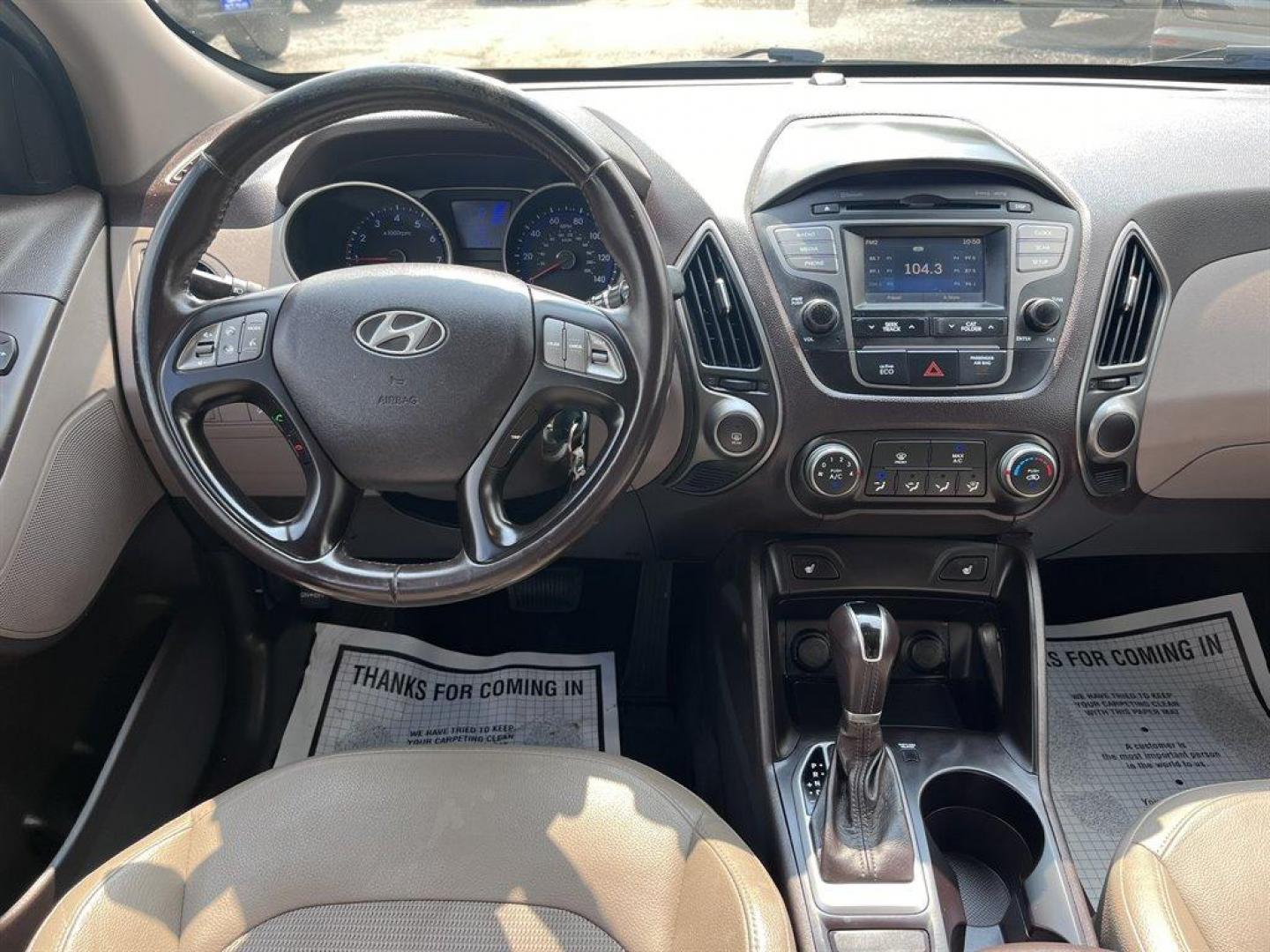 2015 White /Tan Hyundai Tucson (KM8JU3AG7FU) with an 2.4l I-4 DI Dohc 2.4l engine, Automatic transmission, located at 745 East Steele Rd., West Columbia, SC, 29170, (803) 755-9148, 33.927212, -81.148483 - Special Internet Price! 2015 Hyundai Tucson - Photo#4