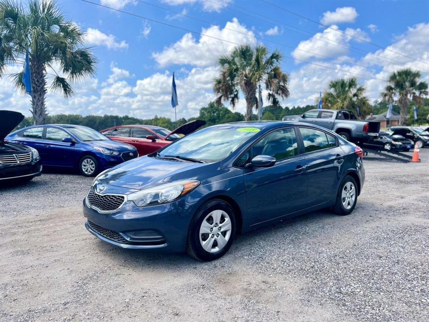 2015 Blue /Grey Kia Forte (KNAFX4A69F5) with an 1.8l I-4 MPI 1.8l engine, Automatic transmission, located at 745 East Steele Rd., West Columbia, SC, 29170, (803) 755-9148, 33.927212, -81.148483 - Special Internet Price! 2015 Kia Forte with AM/FM radio, Bluetooth for hands free calling, Manual air conditioning, Cloth interior, Powered windows, Powered door locks, Plus more! - Photo#0