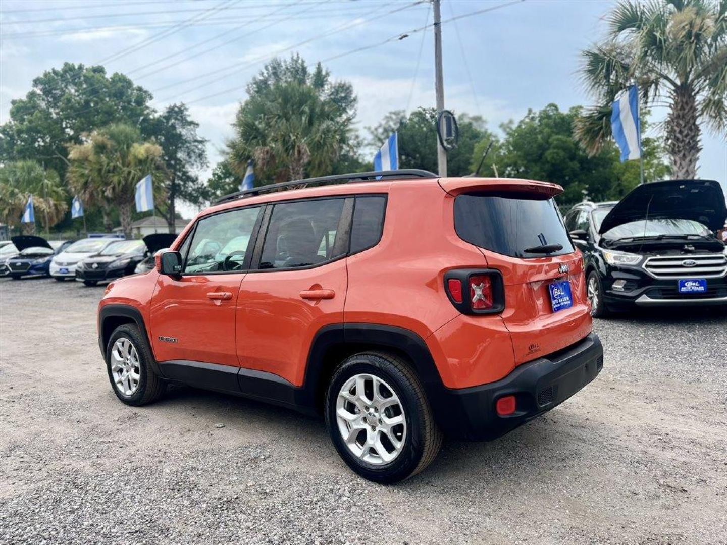 2015 Orange /Grey Jeep Renegade (ZACCJABT0FP) with an 2.4l I-4 Smpi Dohc 2.4l engine, Automatic transmission, located at 745 East Steele Rd., West Columbia, SC, 29170, (803) 755-9148, 33.927212, -81.148483 - Special Internet Price! 2015 Jeep Renegade Latitude with AM/FM radio, Backup camera, Cruise control, Automatic air conditioning, Push to start, Keyless entry, Cloth interior, Powered windows, Powered door locks, Plus more! - Photo#1