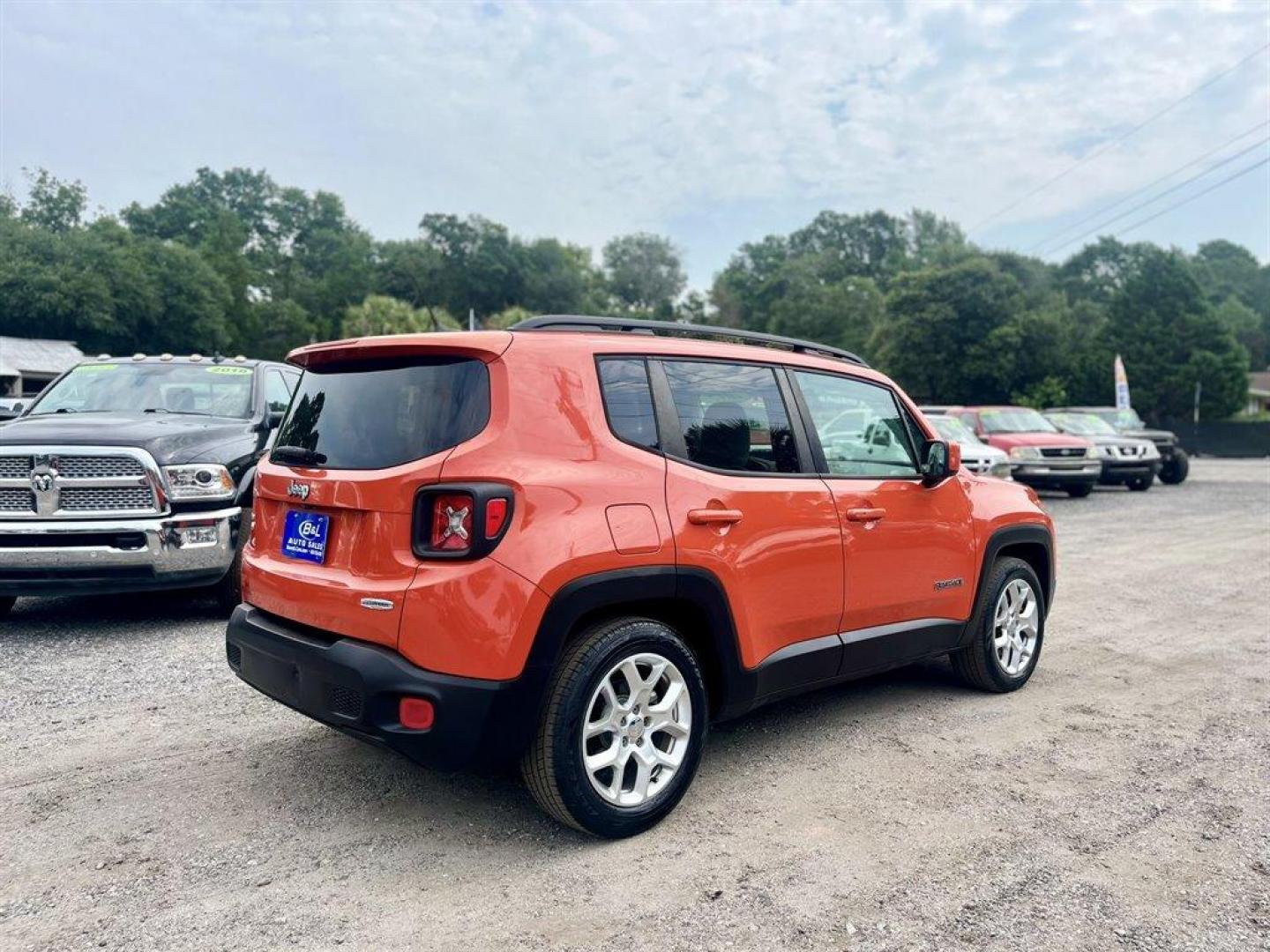 2015 Orange /Grey Jeep Renegade (ZACCJABT0FP) with an 2.4l I-4 Smpi Dohc 2.4l engine, Automatic transmission, located at 745 East Steele Rd., West Columbia, SC, 29170, (803) 755-9148, 33.927212, -81.148483 - Special Internet Price! 2015 Jeep Renegade Latitude with AM/FM radio, Backup camera, Cruise control, Automatic air conditioning, Push to start, Keyless entry, Cloth interior, Powered windows, Powered door locks, Plus more! - Photo#2