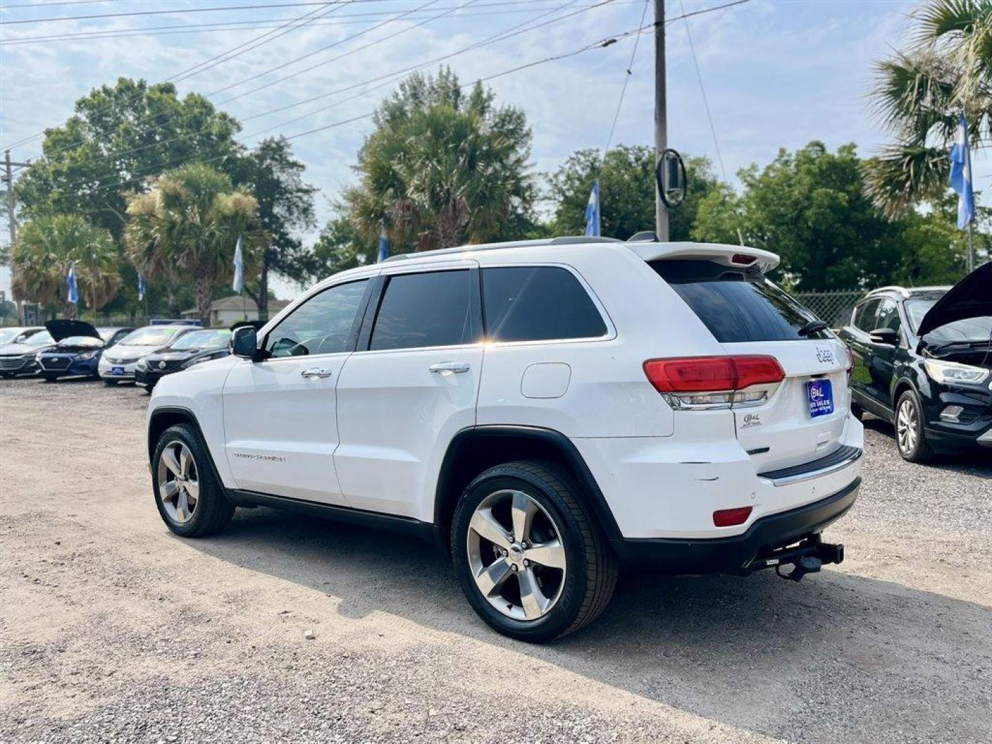 2014 White /Black Jeep Grand Cherokee (1C4RJEBMXEC) with an 3.0l V6 DI Dohc Tdsl 3.0l engine, Automatic transmission, located at 745 East Steele Rd., West Columbia, SC, 29170, (803) 755-9148, 33.927212, -81.148483 - Special Internet Price! 2014 Jeep Grand Cherokee Limited with AM/FM radio, Backup camera, Cruise control, Sunroof, Black leather seats, Powered front seats, Heated seats, Powered windows, Powered door locks, Plus more! - Photo#1