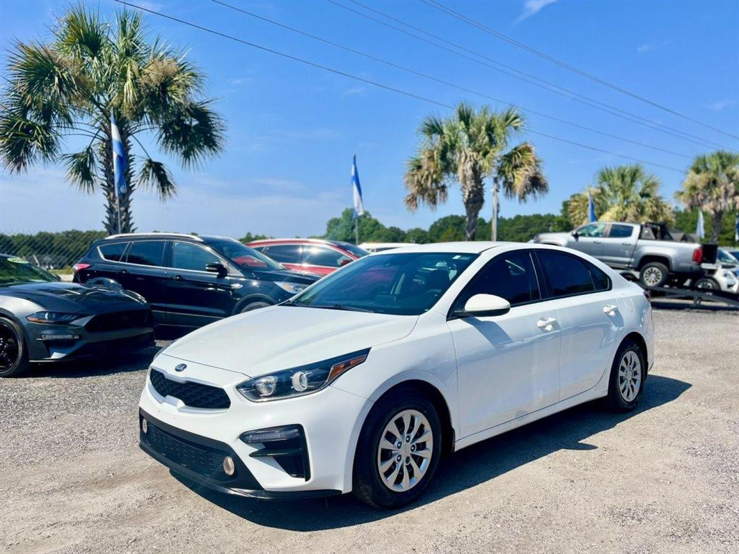 2021 White /Black Kia Forte (3KPF24AD7ME) with an 2.0l I-4 MPI Dohc 2.0l engine, Automatic transmission, located at 745 East Steele Rd., West Columbia, SC, 29170, (803) 755-9148, 33.927212, -81.148483 - Special Internet Price! 2021 Kia Forte FE with Bluetooth, AM/FM radio, Backup camera, Keyless entry, Manual air conditioning, Black cloth interior, Powered windows, Powered door locks, Plus more! - Photo#0