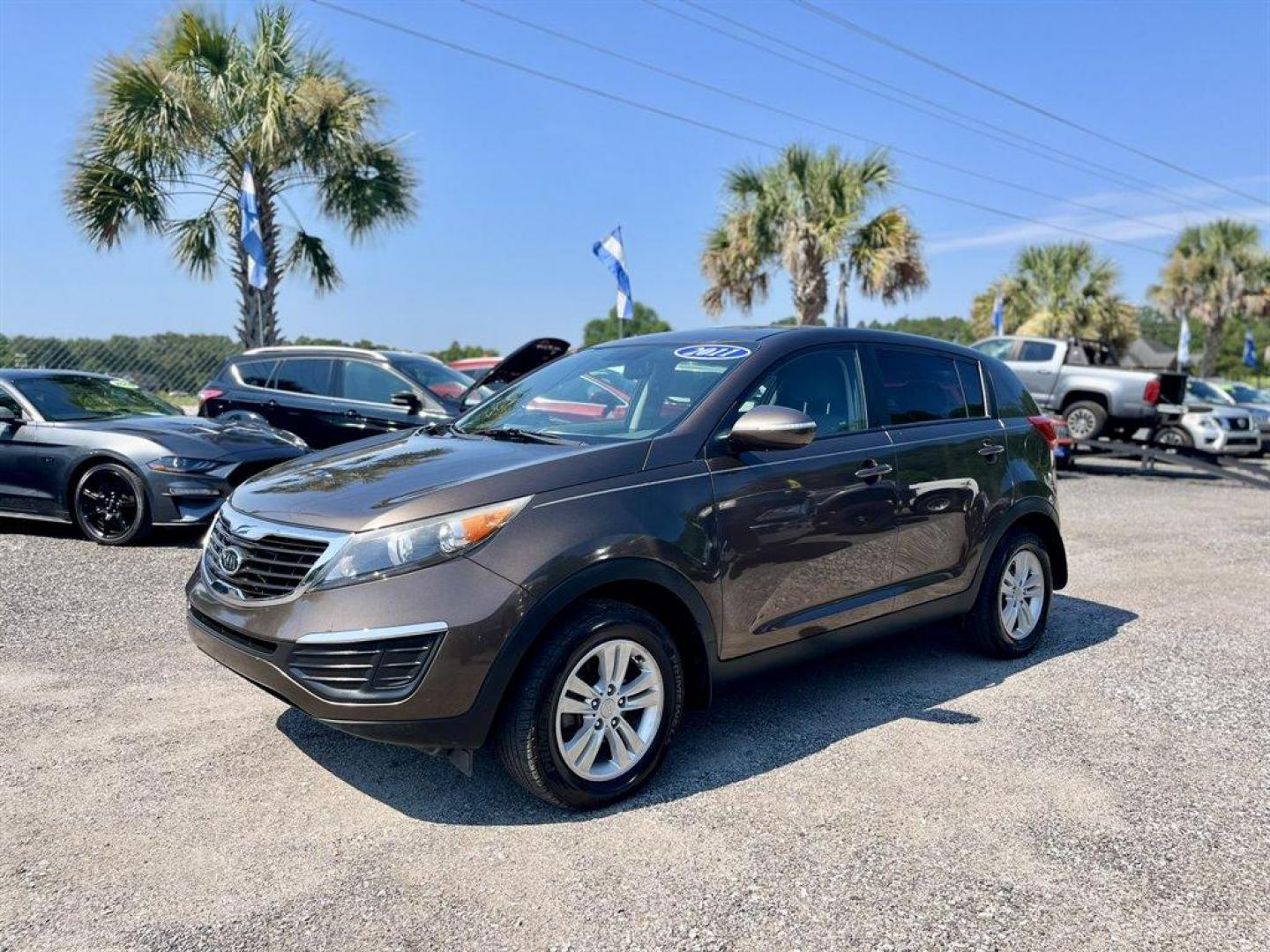 2011 Brown /Grey Kia Sportage (KNDPB3A2XB7) with an 2.4l I-4 MPI Dohc Cvvt 2. engine, Automatic transmission, located at 745 East Steele Rd., West Columbia, SC, 29170, (803) 755-9148, 33.927212, -81.148483 - Special Internet Price! 2011 Kia Sportage Base with AM/FM radio, Cruise control, Manual air conditioning, Cloth interior, Powered windows, Powered door locks, Plus more! - Photo#0