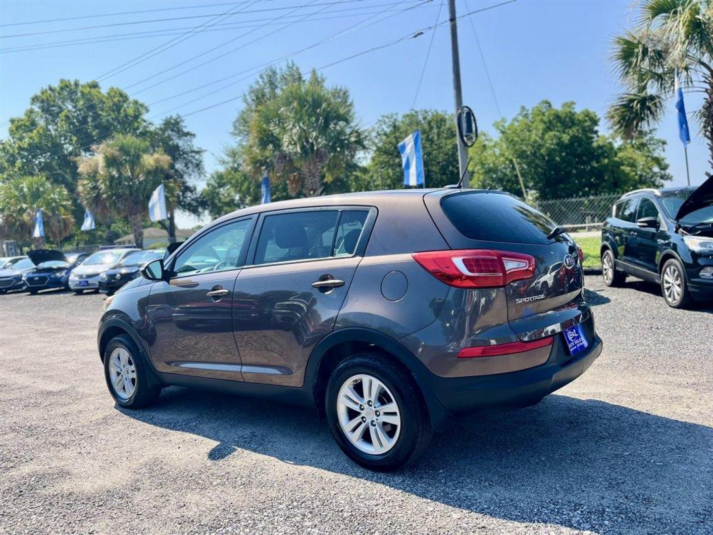 2011 Brown /Grey Kia Sportage (KNDPB3A2XB7) with an 2.4l I-4 MPI Dohc Cvvt 2. engine, Automatic transmission, located at 745 East Steele Rd., West Columbia, SC, 29170, (803) 755-9148, 33.927212, -81.148483 - Special Internet Price! 2011 Kia Sportage Base with AM/FM radio, Cruise control, Manual air conditioning, Cloth interior, Powered windows, Powered door locks, Plus more! - Photo#1