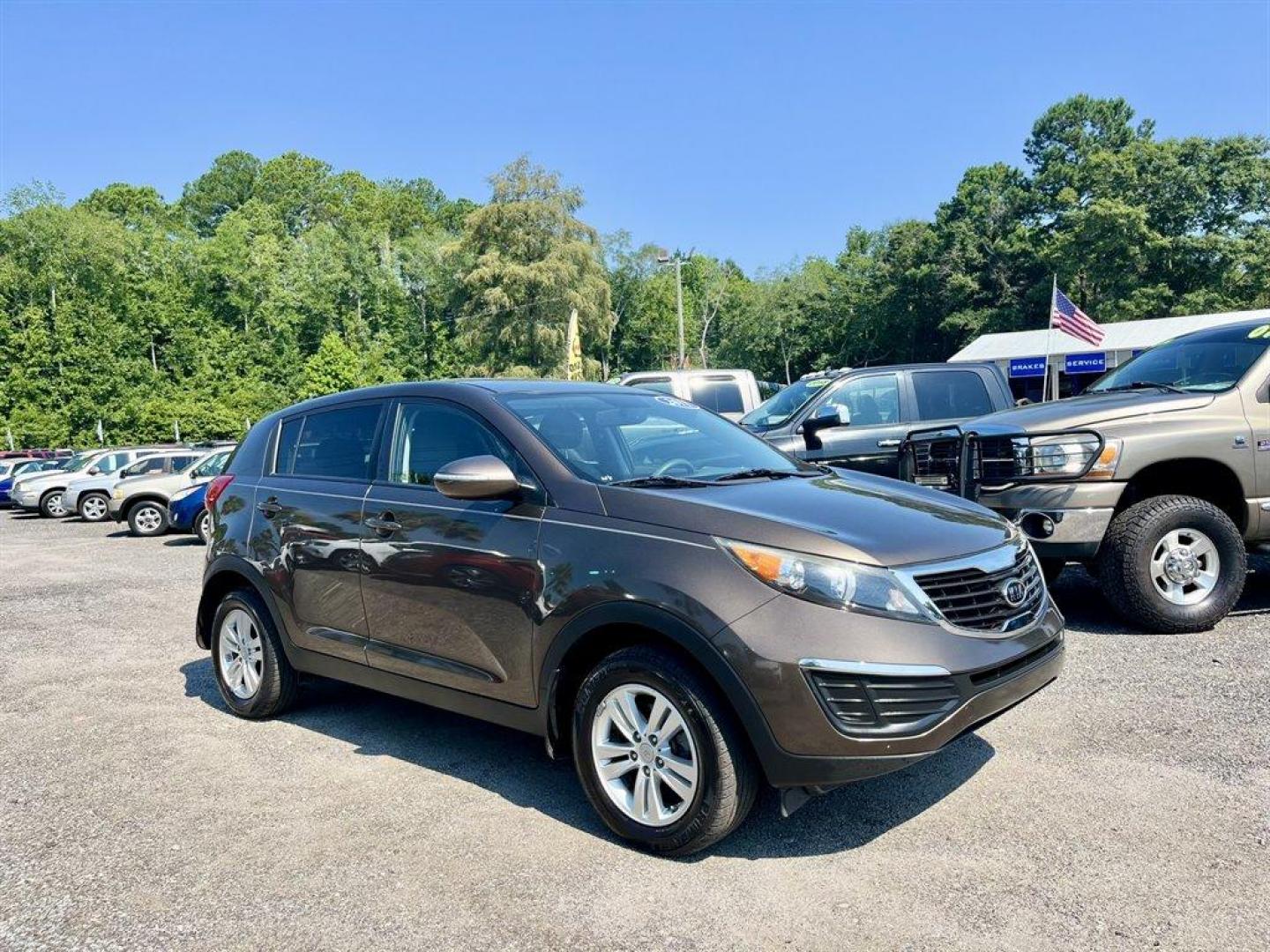 2011 Brown /Grey Kia Sportage (KNDPB3A2XB7) with an 2.4l I-4 MPI Dohc Cvvt 2. engine, Automatic transmission, located at 745 East Steele Rd., West Columbia, SC, 29170, (803) 755-9148, 33.927212, -81.148483 - Special Internet Price! 2011 Kia Sportage Base with AM/FM radio, Cruise control, Manual air conditioning, Cloth interior, Powered windows, Powered door locks, Plus more! - Photo#3